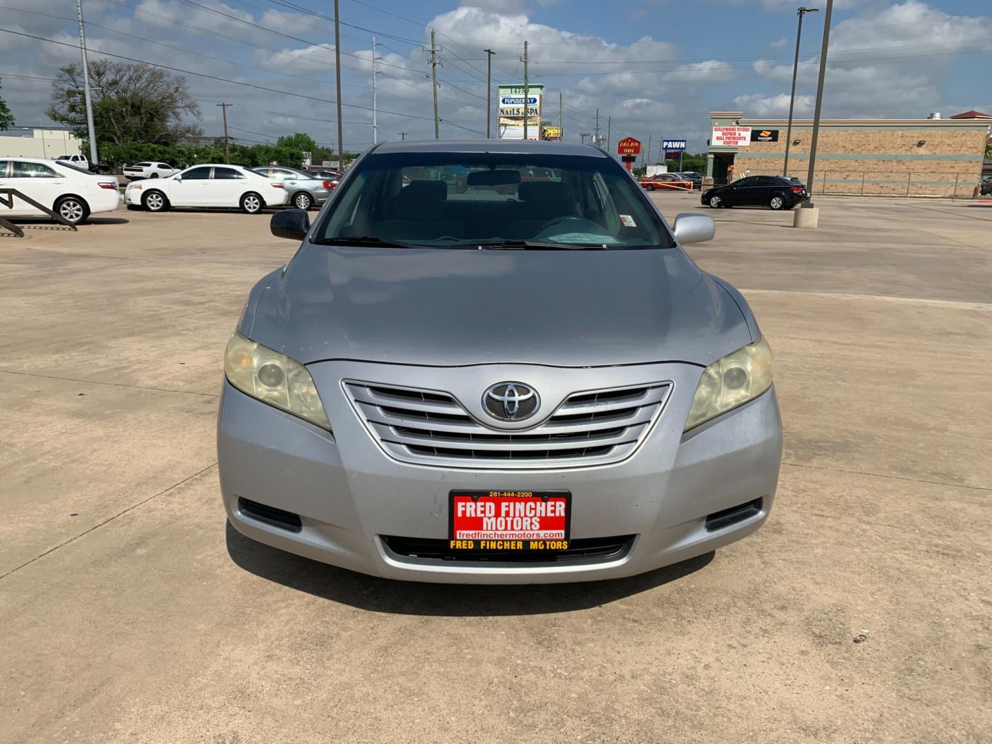 2009 silver Toyota Camry LE V6 6-Spd AT (4T1BK46K39U) with an 3.5L V6 DOHC 24V engine, 6-Speed Automatic Overdrive transmission, located at 14700 Tomball Parkway 249, Houston, TX, 77086, (281) 444-2200, 29.928619, -95.504074 - Photo#1