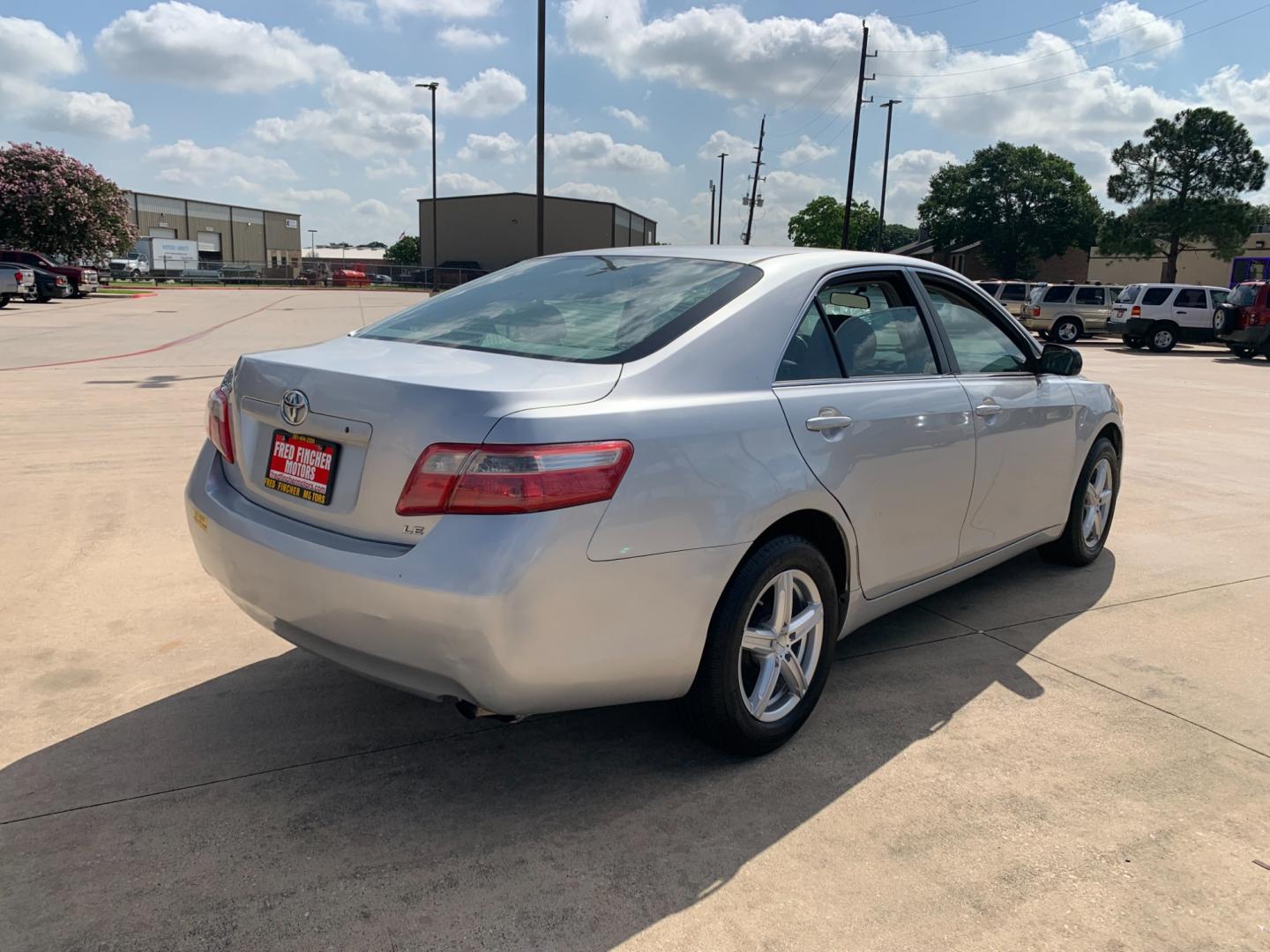 2009 silver Toyota Camry LE V6 6-Spd AT (4T1BK46K39U) with an 3.5L V6 DOHC 24V engine, 6-Speed Automatic Overdrive transmission, located at 14700 Tomball Parkway 249, Houston, TX, 77086, (281) 444-2200, 29.928619, -95.504074 - Photo#6