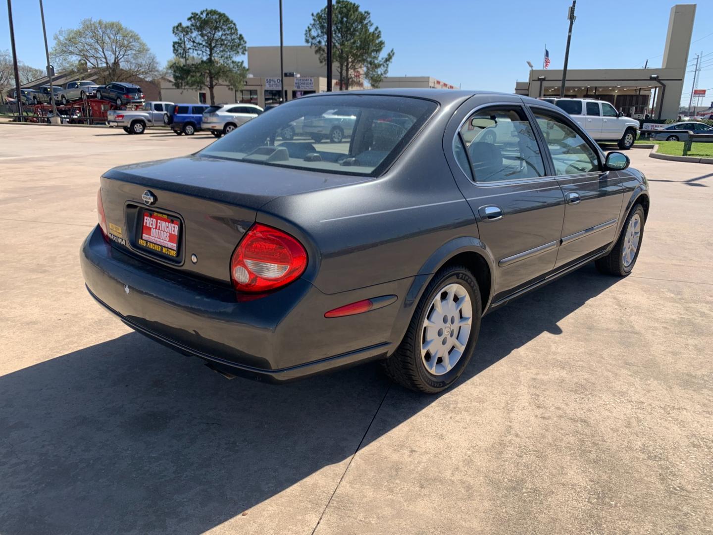 2001 GRAY Nissan Maxima GLE (JN1CA31D41T) with an 3.0L V6 DOHC 24V engine, 4-Speed Automatic Overdrive transmission, located at 14700 Tomball Parkway 249, Houston, TX, 77086, (281) 444-2200, 29.928619, -95.504074 - Photo#6