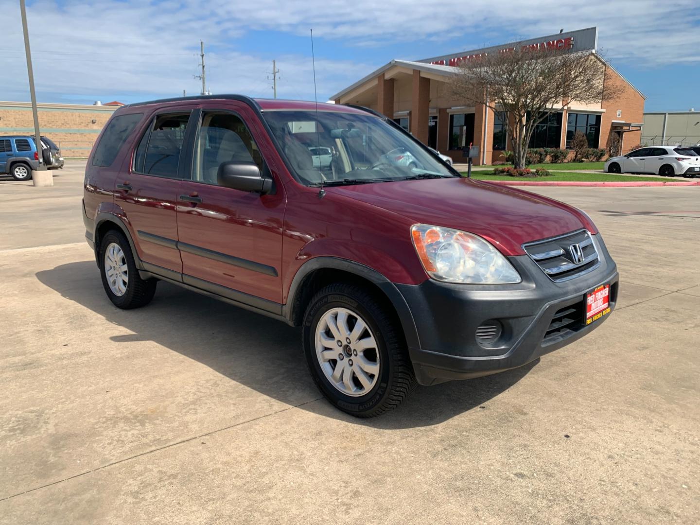 2005 red Honda CR-V EX 4WD AT (JHLRD78855C) with an 2.4L L4 DOHC 16V engine, 5-Speed Automatic Overdrive transmission, located at 14700 Tomball Parkway 249, Houston, TX, 77086, (281) 444-2200, 29.928619, -95.504074 - Photo#0