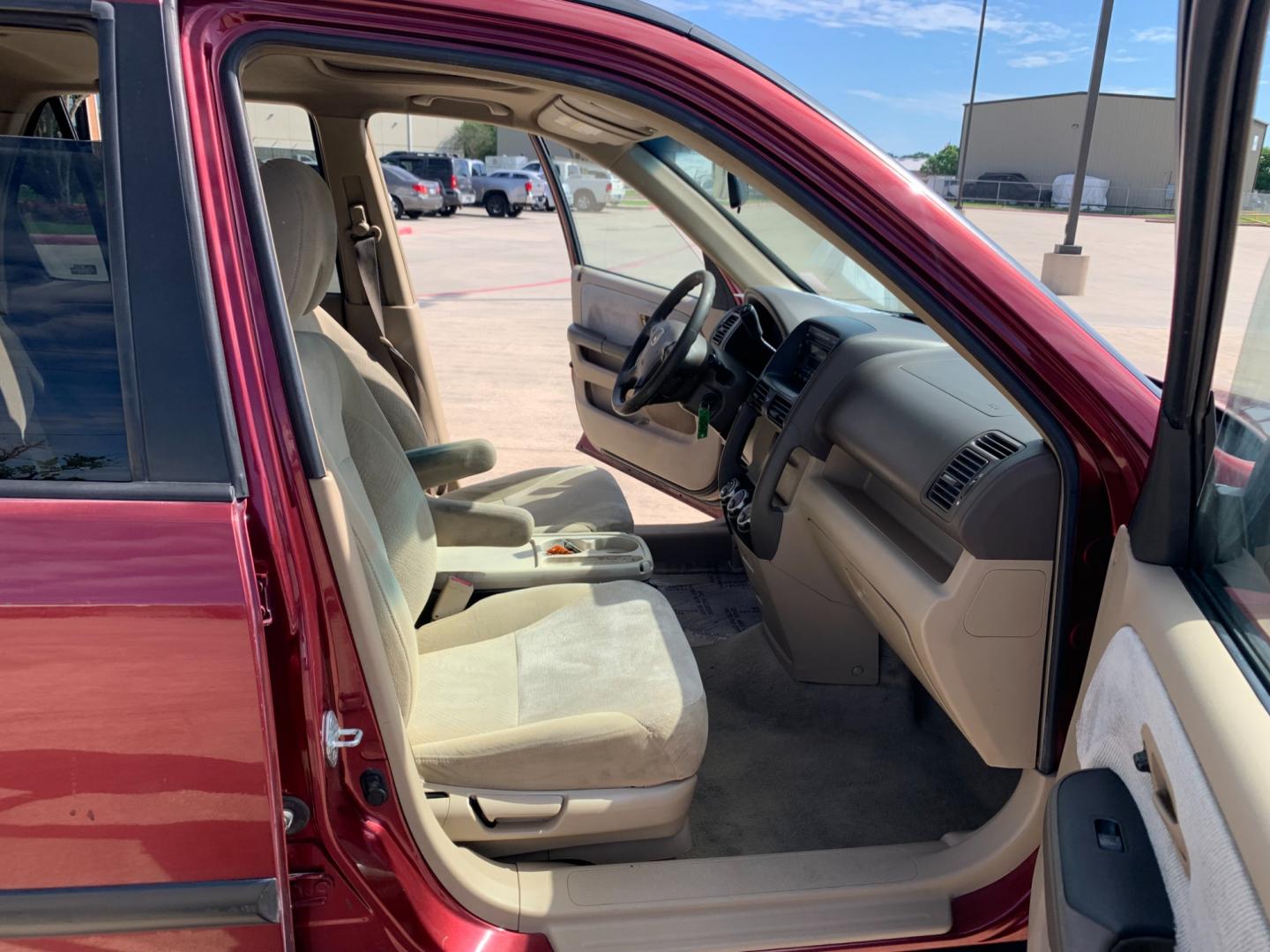 2005 red Honda CR-V EX 4WD AT (JHLRD78855C) with an 2.4L L4 DOHC 16V engine, 5-Speed Automatic Overdrive transmission, located at 14700 Tomball Parkway 249, Houston, TX, 77086, (281) 444-2200, 29.928619, -95.504074 - Photo#11