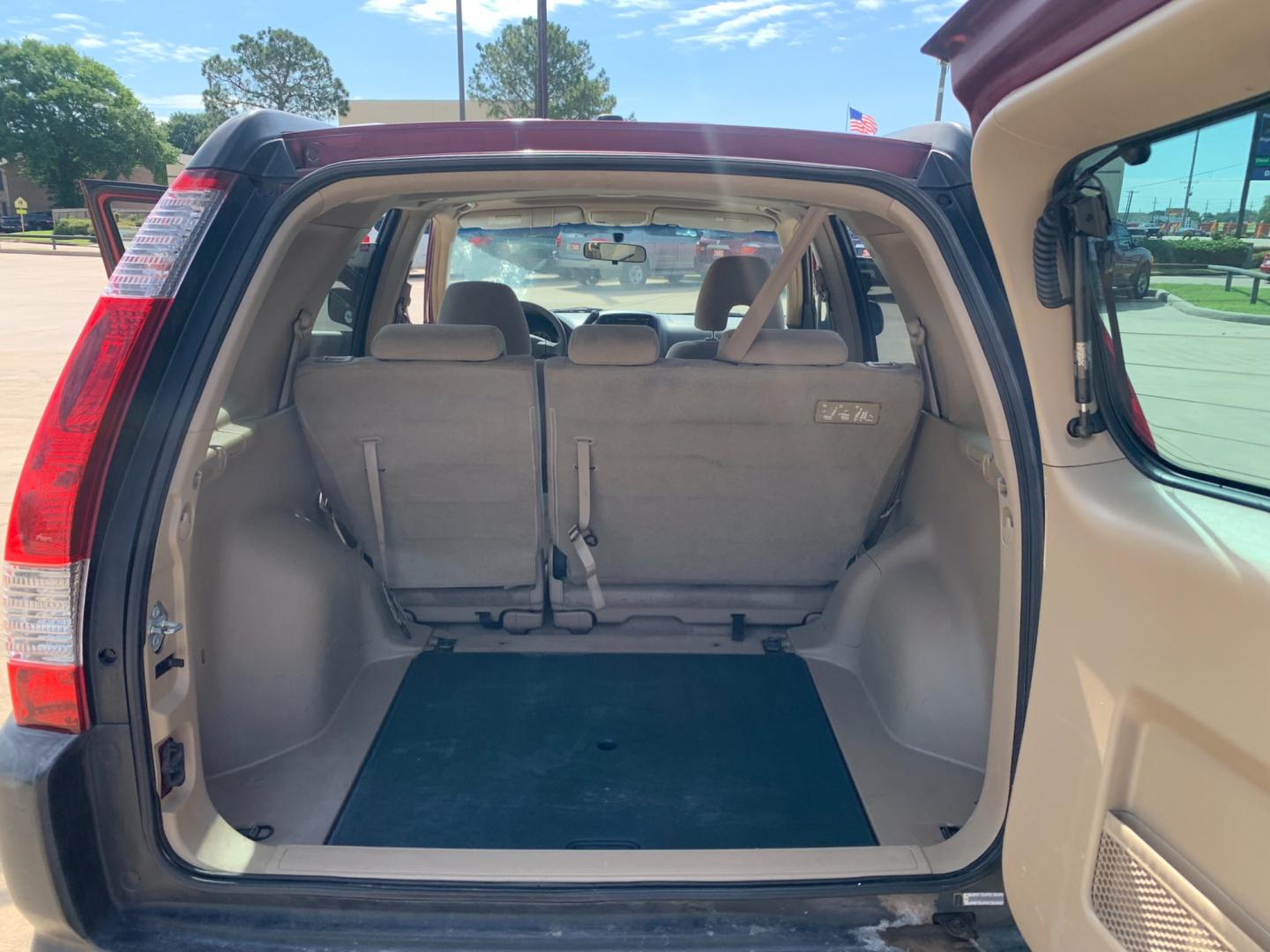 2005 red Honda CR-V EX 4WD AT (JHLRD78855C) with an 2.4L L4 DOHC 16V engine, 5-Speed Automatic Overdrive transmission, located at 14700 Tomball Parkway 249, Houston, TX, 77086, (281) 444-2200, 29.928619, -95.504074 - Photo#13