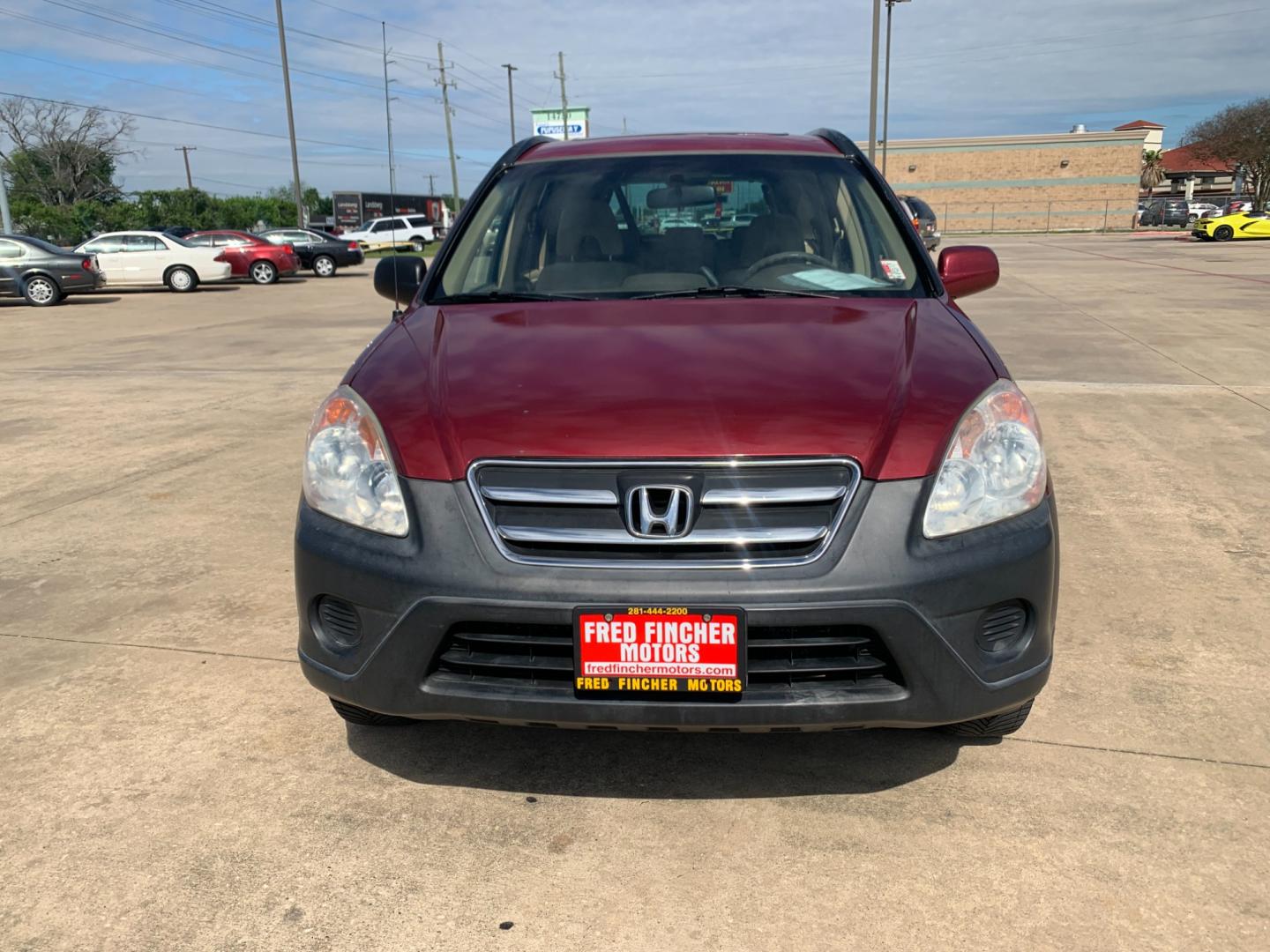 2005 red Honda CR-V EX 4WD AT (JHLRD78855C) with an 2.4L L4 DOHC 16V engine, 5-Speed Automatic Overdrive transmission, located at 14700 Tomball Parkway 249, Houston, TX, 77086, (281) 444-2200, 29.928619, -95.504074 - Photo#1