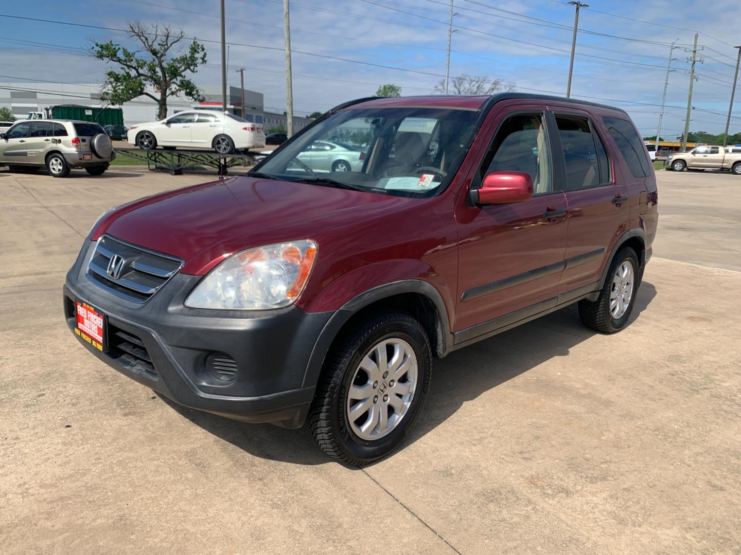 2005 red Honda CR-V EX 4WD AT (JHLRD78855C) with an 2.4L L4 DOHC 16V engine, 5-Speed Automatic Overdrive transmission, located at 14700 Tomball Parkway 249, Houston, TX, 77086, (281) 444-2200, 29.928619, -95.504074 - Photo#2