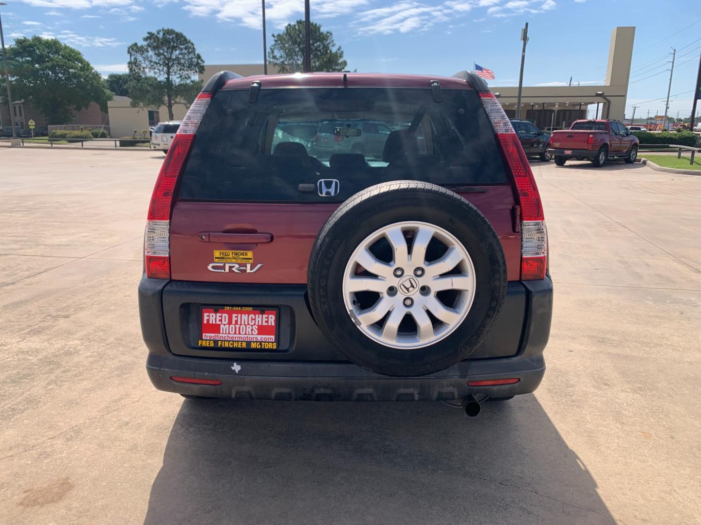 2005 red Honda CR-V EX 4WD AT (JHLRD78855C) with an 2.4L L4 DOHC 16V engine, 5-Speed Automatic Overdrive transmission, located at 14700 Tomball Parkway 249, Houston, TX, 77086, (281) 444-2200, 29.928619, -95.504074 - Photo#5