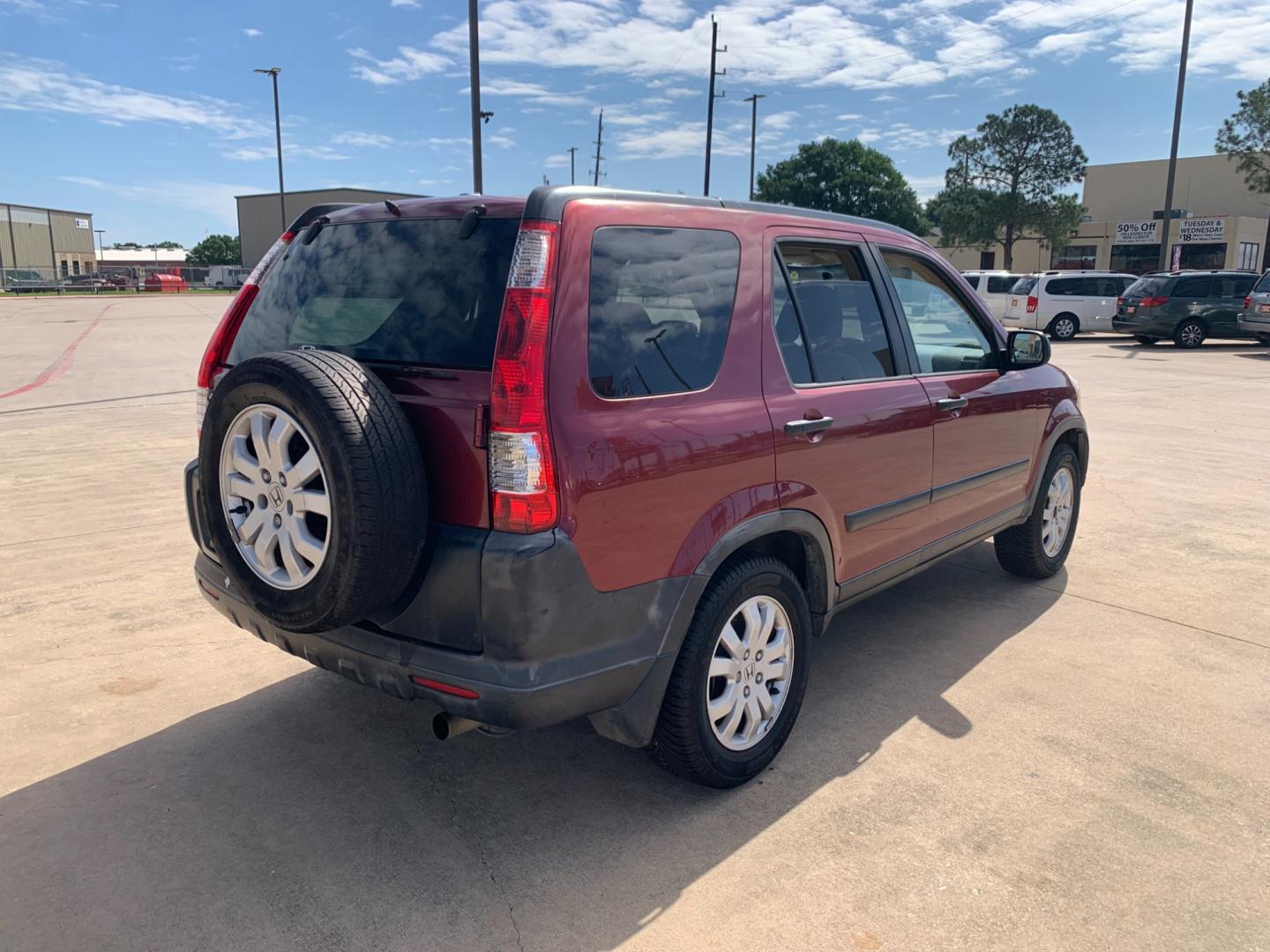 2005 red Honda CR-V EX 4WD AT (JHLRD78855C) with an 2.4L L4 DOHC 16V engine, 5-Speed Automatic Overdrive transmission, located at 14700 Tomball Parkway 249, Houston, TX, 77086, (281) 444-2200, 29.928619, -95.504074 - Photo#6