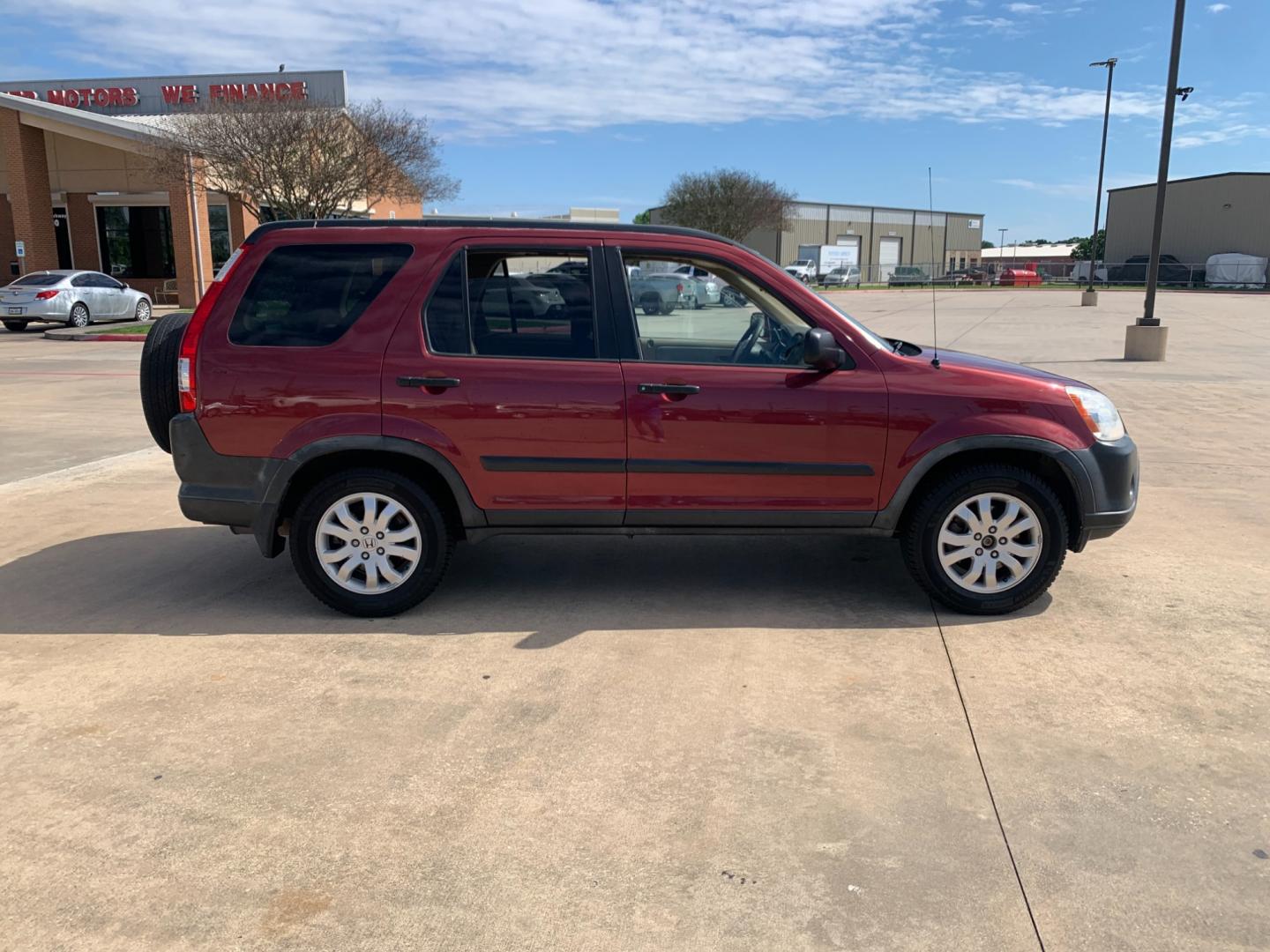 2005 red Honda CR-V EX 4WD AT (JHLRD78855C) with an 2.4L L4 DOHC 16V engine, 5-Speed Automatic Overdrive transmission, located at 14700 Tomball Parkway 249, Houston, TX, 77086, (281) 444-2200, 29.928619, -95.504074 - Photo#7