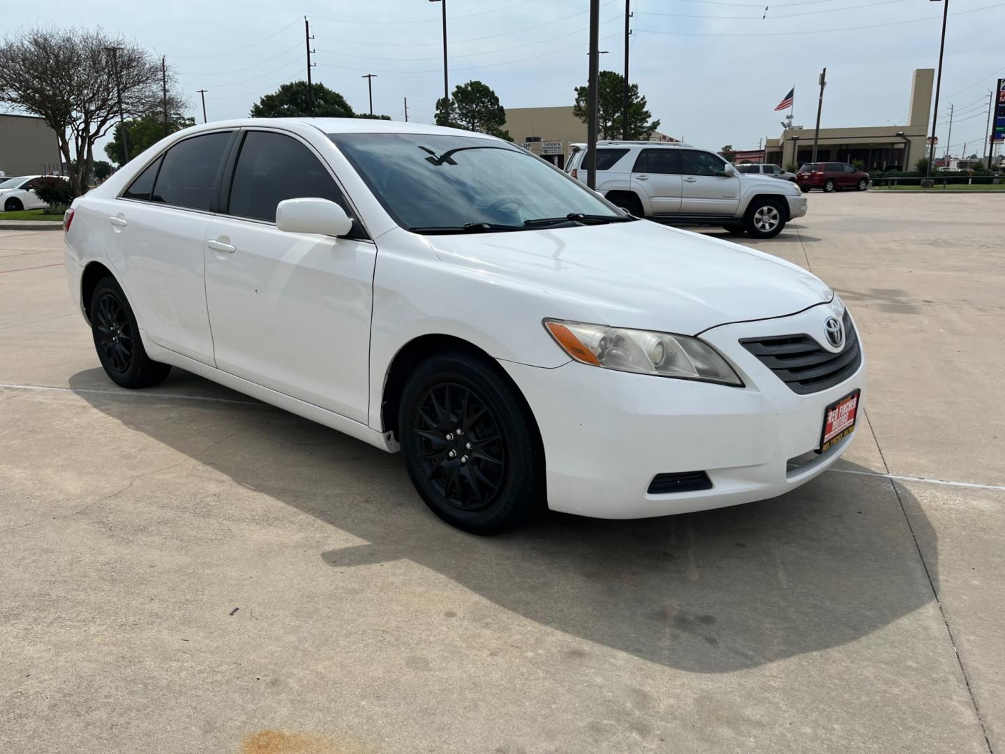 2007 white /gray Toyota Camry CE 5-Spd AT (JTNBE46K373) with an 2.4L L4 DOHC 16V engine, 5-Speed Automatic Overdrive transmission, located at 14700 Tomball Parkway 249, Houston, TX, 77086, (281) 444-2200, 29.928619, -95.504074 - Photo#0