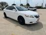 2007 white /gray Toyota Camry CE 5-Spd AT (JTNBE46K373) with an 2.4L L4 DOHC 16V engine, 5-Speed Automatic Overdrive transmission, located at 14700 Tomball Parkway 249, Houston, TX, 77086, (281) 444-2200, 29.928619, -95.504074 - Photo#0