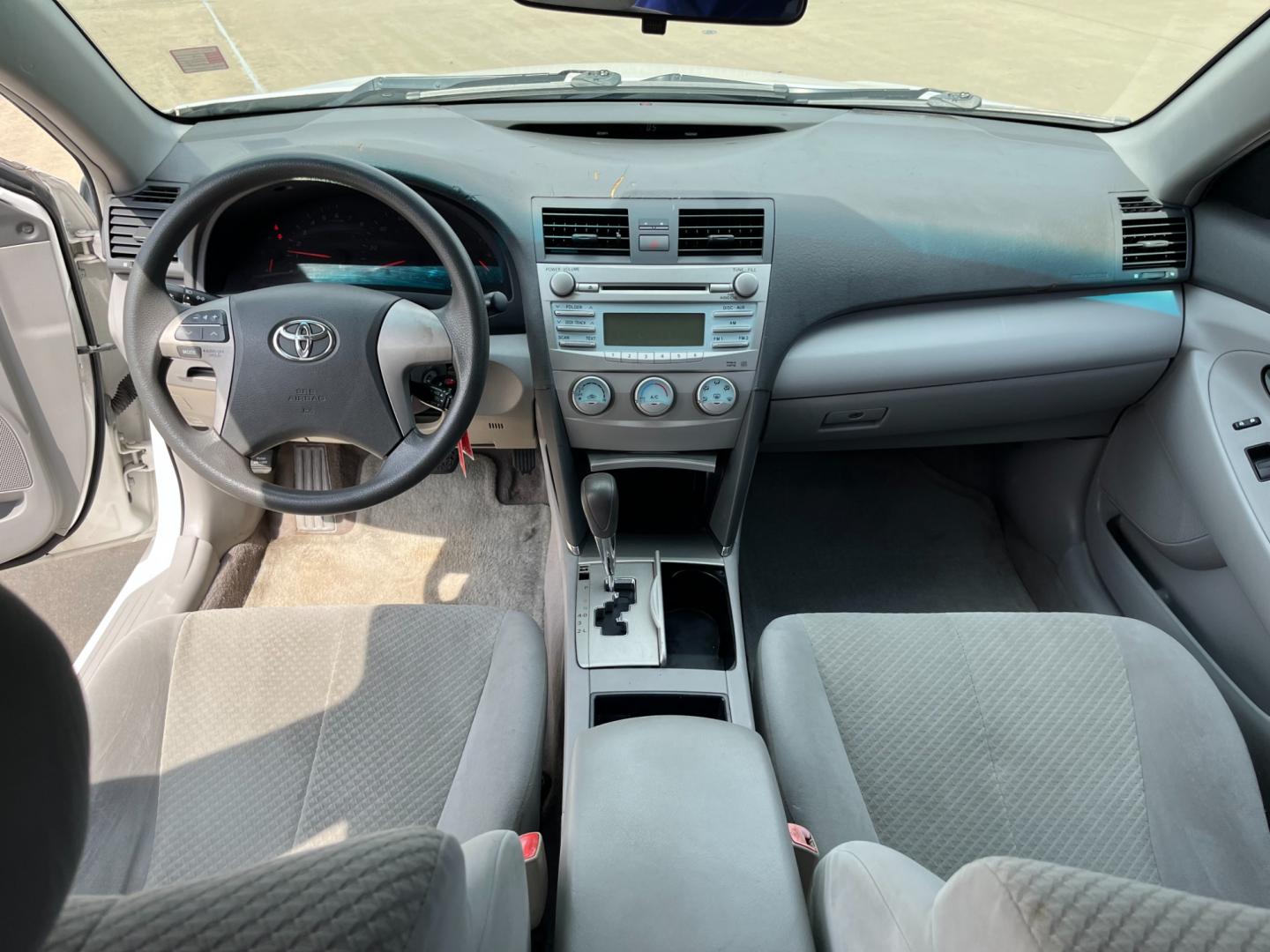 2007 white /gray Toyota Camry CE 5-Spd AT (JTNBE46K373) with an 2.4L L4 DOHC 16V engine, 5-Speed Automatic Overdrive transmission, located at 14700 Tomball Parkway 249, Houston, TX, 77086, (281) 444-2200, 29.928619, -95.504074 - Photo#10