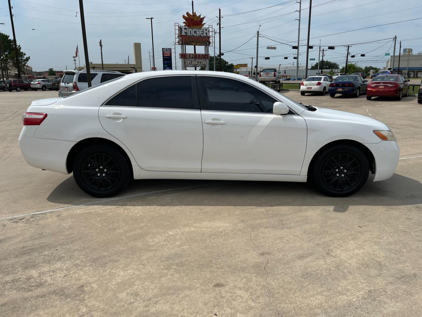 2007 white /gray Toyota Camry CE 5-Spd AT (JTNBE46K373) with an 2.4L L4 DOHC 16V engine, 5-Speed Automatic Overdrive transmission, located at 14700 Tomball Parkway 249, Houston, TX, 77086, (281) 444-2200, 29.928619, -95.504074 - Photo#7