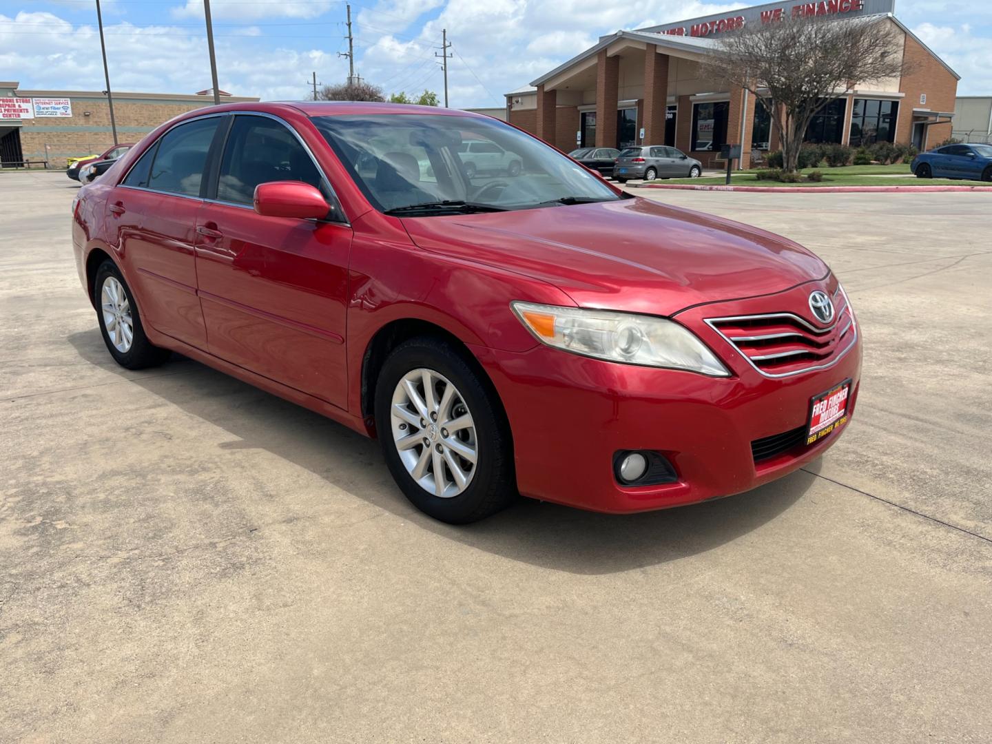 2010 red /TAN Toyota Camry LE V6 6-Spd AT (4T1BK3EK7AU) with an 3.5L V6 DOHC 24V engine, 6-Speed Automatic transmission, located at 14700 Tomball Parkway 249, Houston, TX, 77086, (281) 444-2200, 29.928619, -95.504074 - Photo#0