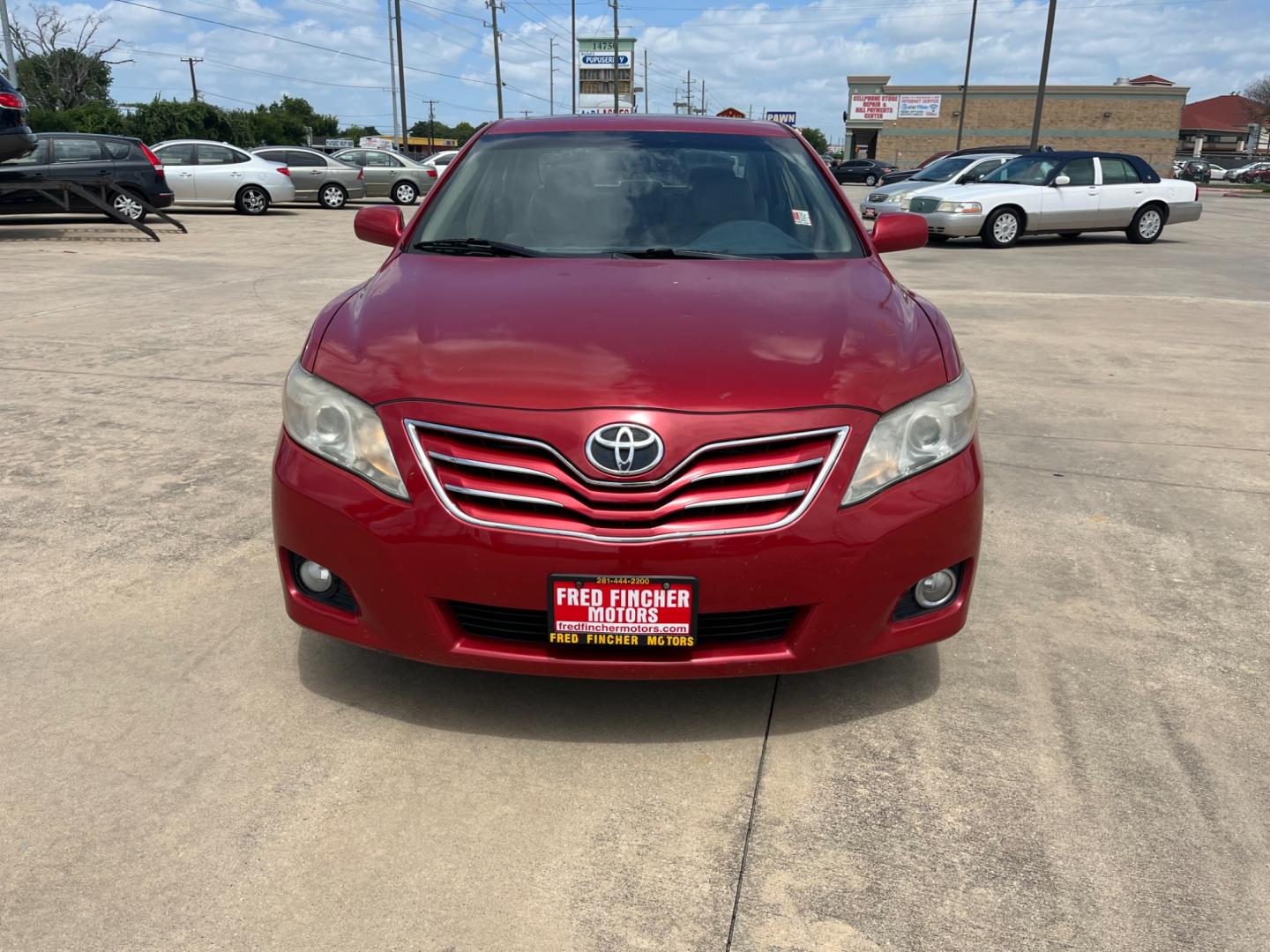 2010 red /TAN Toyota Camry LE V6 6-Spd AT (4T1BK3EK7AU) with an 3.5L V6 DOHC 24V engine, 6-Speed Automatic transmission, located at 14700 Tomball Parkway 249, Houston, TX, 77086, (281) 444-2200, 29.928619, -95.504074 - Photo#1