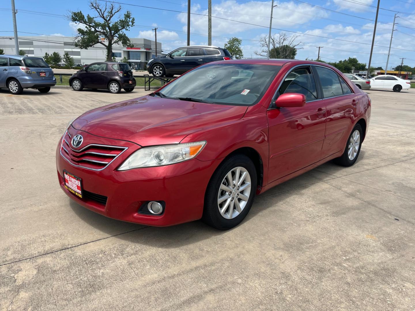 2010 red /TAN Toyota Camry LE V6 6-Spd AT (4T1BK3EK7AU) with an 3.5L V6 DOHC 24V engine, 6-Speed Automatic transmission, located at 14700 Tomball Parkway 249, Houston, TX, 77086, (281) 444-2200, 29.928619, -95.504074 - Photo#2