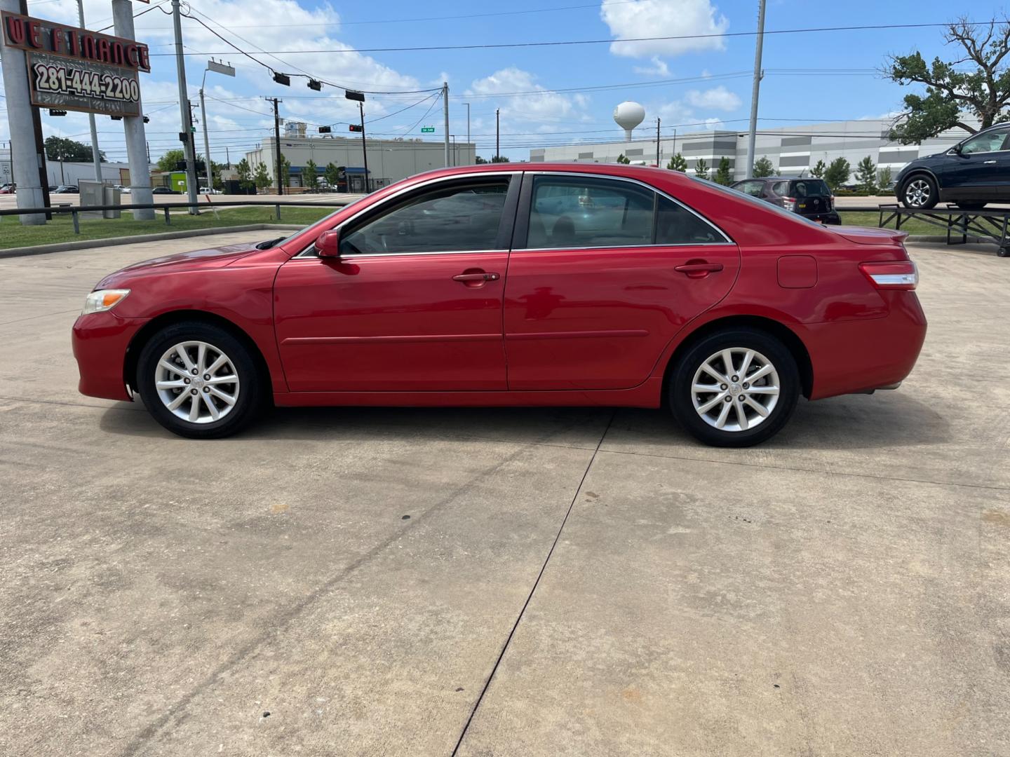 2010 red /TAN Toyota Camry LE V6 6-Spd AT (4T1BK3EK7AU) with an 3.5L V6 DOHC 24V engine, 6-Speed Automatic transmission, located at 14700 Tomball Parkway 249, Houston, TX, 77086, (281) 444-2200, 29.928619, -95.504074 - Photo#3