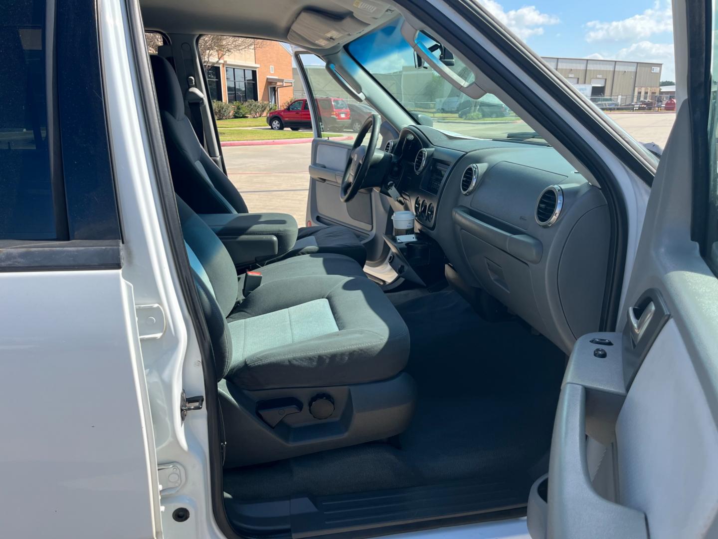 2004 white /gray Ford Expedition XLS 4.6L 2WD (1FMRU13W34L) with an 4.6L V8 SOHC 16V engine, 4-Speed Automatic Overdrive transmission, located at 14700 Tomball Parkway 249, Houston, TX, 77086, (281) 444-2200, 29.928619, -95.504074 - Photo#11