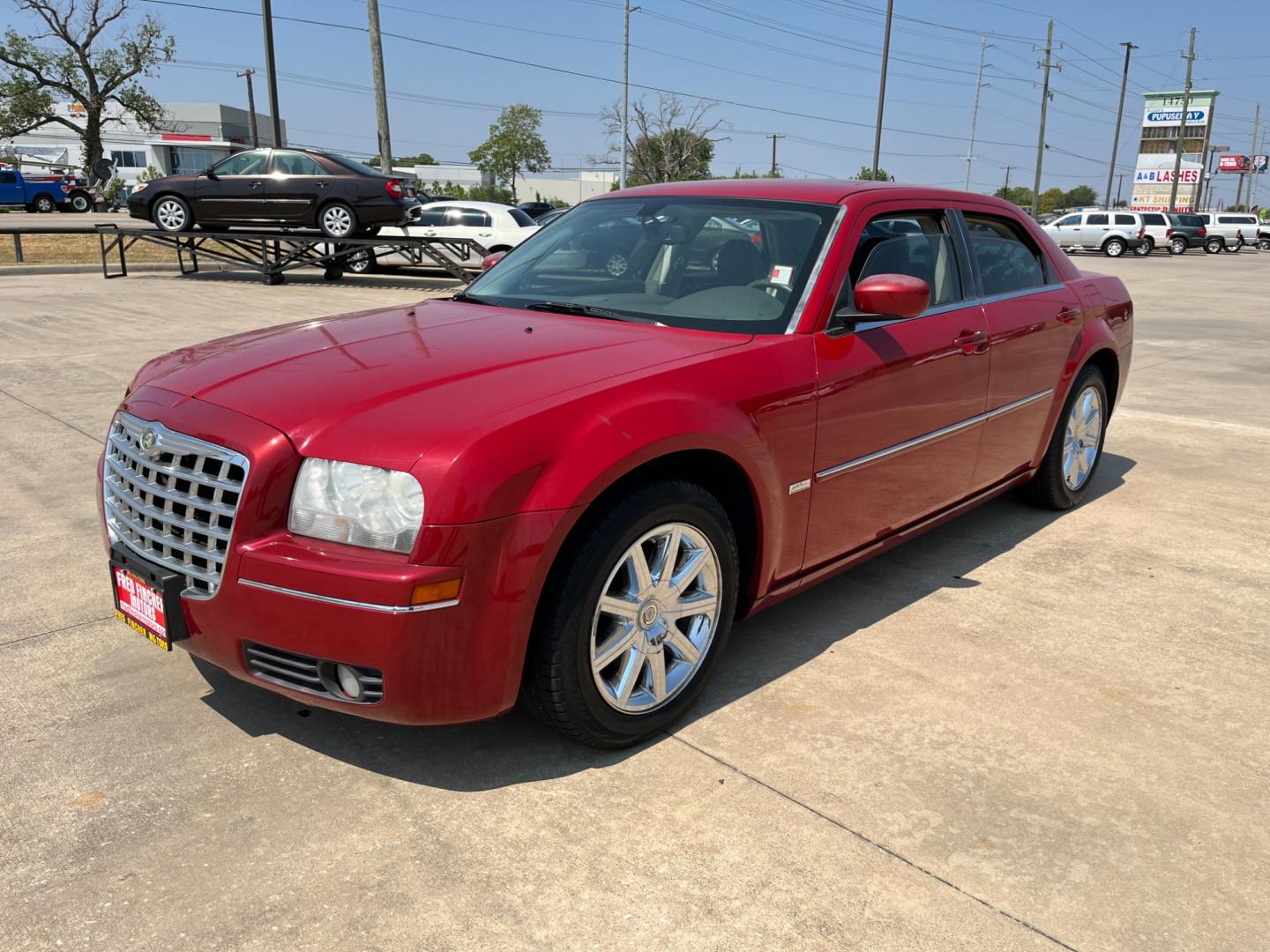 2008 red /TAN Chrysler 300 Touring (2C3LA53GX8H) with an 3.5L V6 DOHC 24V engine, 4-Speed Automatic Overdrive transmission, located at 14700 Tomball Parkway 249, Houston, TX, 77086, (281) 444-2200, 29.928619, -95.504074 - Photo#2