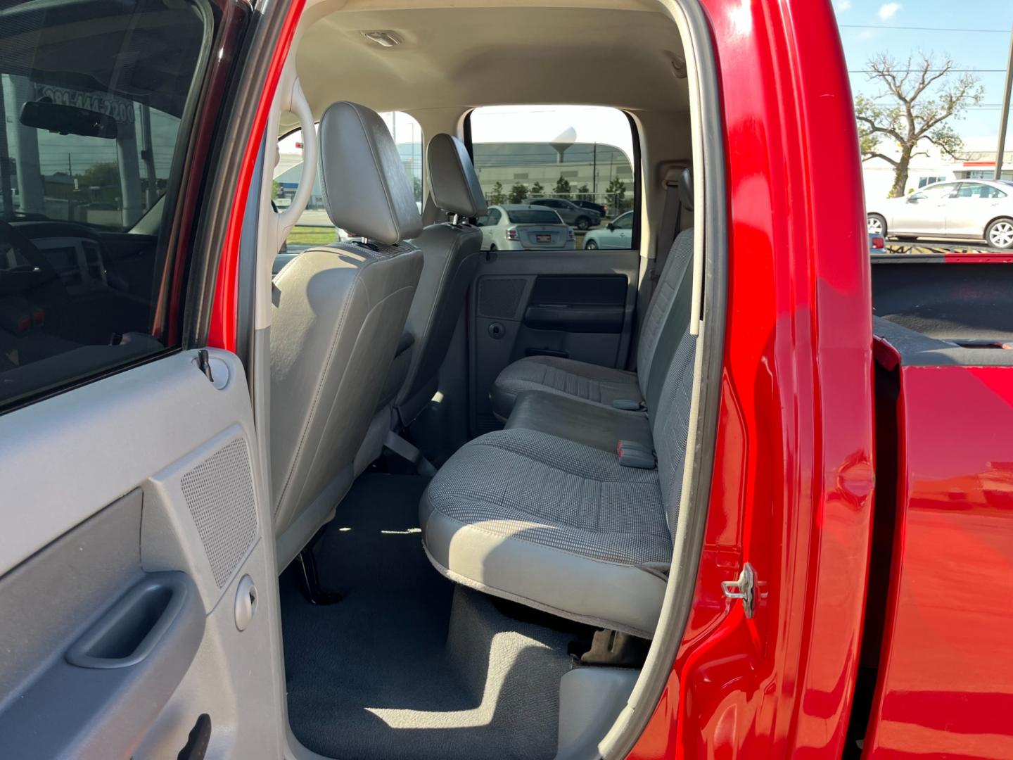 2008 red /gray Dodge Ram 1500 Laramie Quad Cab 2WD (1D7HA18N48S) with an 4.7L V8 SOHC 16V engine, located at 14700 Tomball Parkway 249, Houston, TX, 77086, (281) 444-2200, 29.928619, -95.504074 - Photo#9