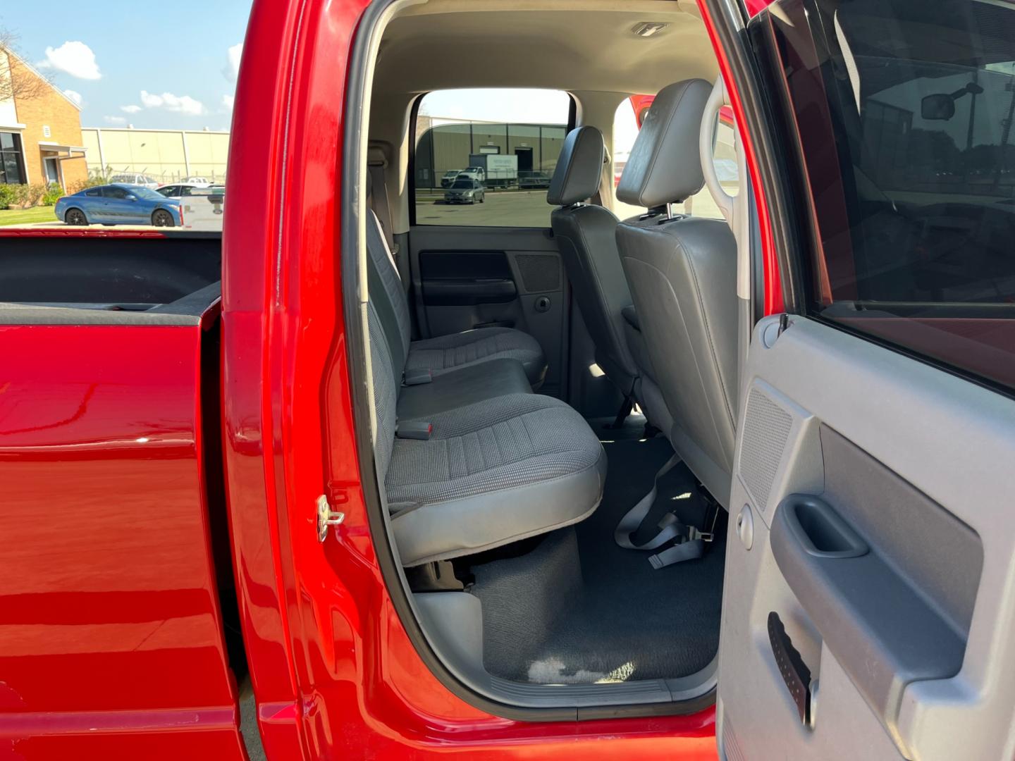 2008 red /gray Dodge Ram 1500 Laramie Quad Cab 2WD (1D7HA18N48S) with an 4.7L V8 SOHC 16V engine, located at 14700 Tomball Parkway 249, Houston, TX, 77086, (281) 444-2200, 29.928619, -95.504074 - Photo#12