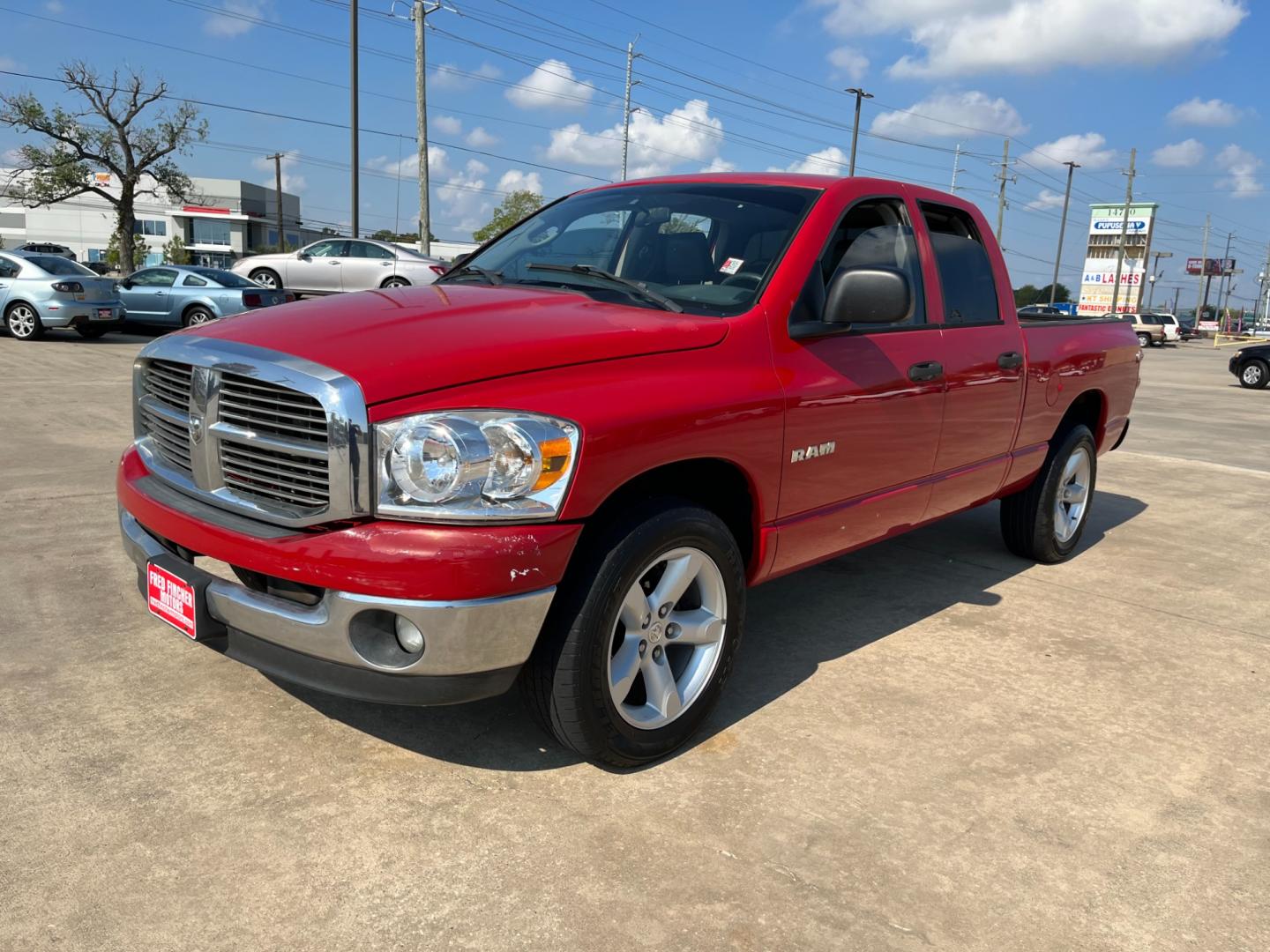 2008 red /gray Dodge Ram 1500 Laramie Quad Cab 2WD (1D7HA18N48S) with an 4.7L V8 SOHC 16V engine, located at 14700 Tomball Parkway 249, Houston, TX, 77086, (281) 444-2200, 29.928619, -95.504074 - Photo#2