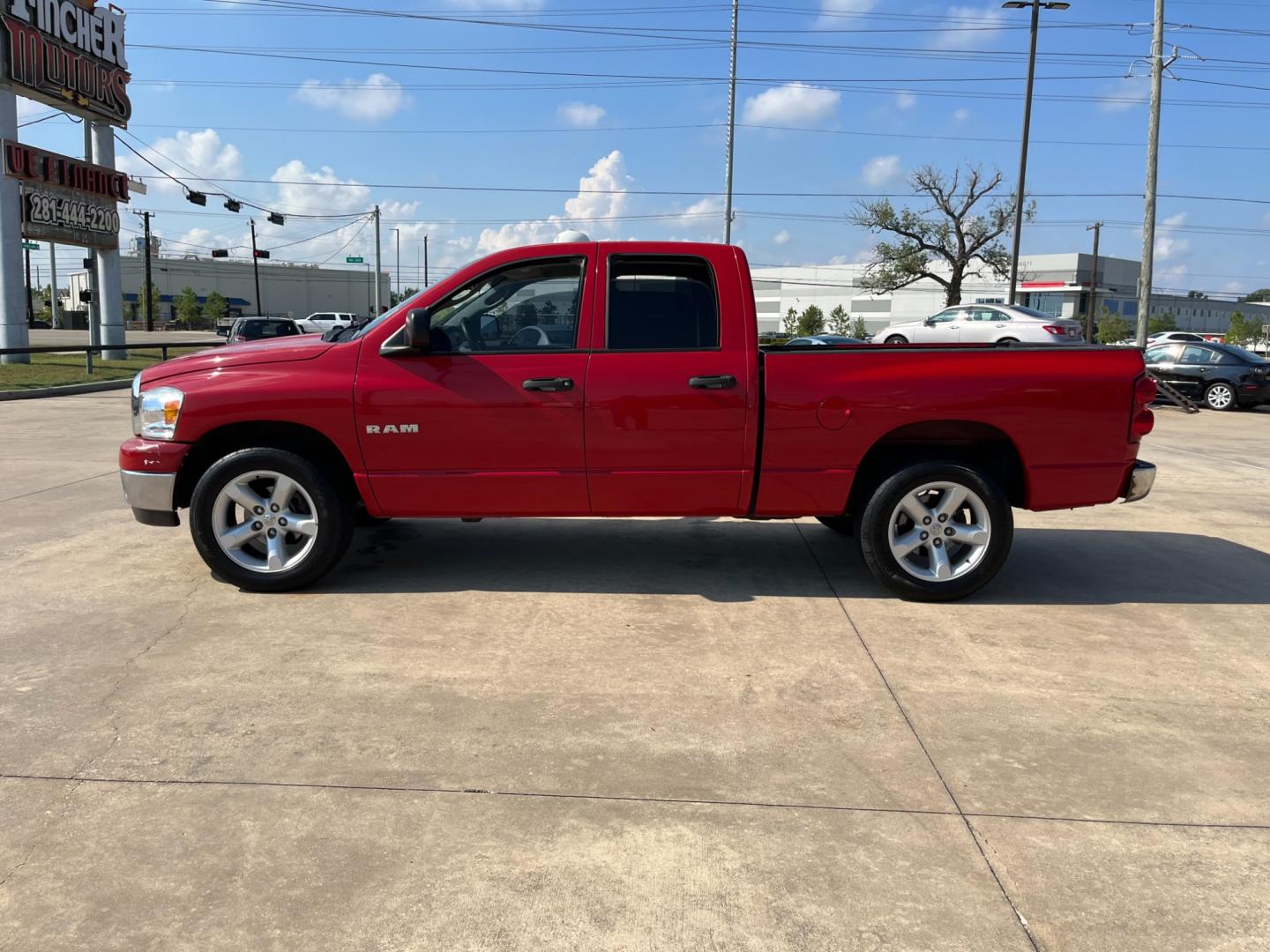 2008 red /gray Dodge Ram 1500 Laramie Quad Cab 2WD (1D7HA18N48S) with an 4.7L V8 SOHC 16V engine, located at 14700 Tomball Parkway 249, Houston, TX, 77086, (281) 444-2200, 29.928619, -95.504074 - Photo#3