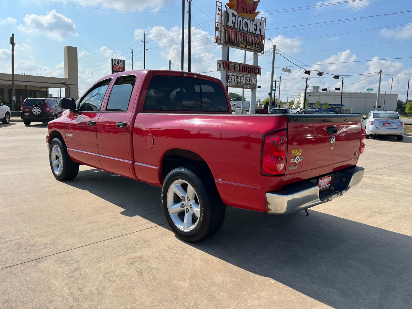 2008 red /gray Dodge Ram 1500 Laramie Quad Cab 2WD (1D7HA18N48S) with an 4.7L V8 SOHC 16V engine, located at 14700 Tomball Parkway 249, Houston, TX, 77086, (281) 444-2200, 29.928619, -95.504074 - Photo#4