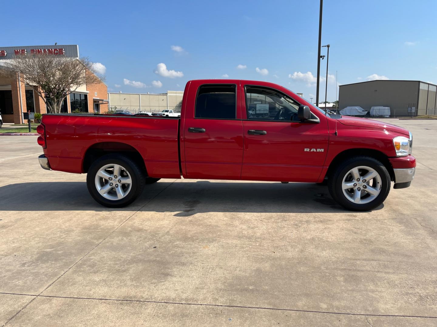 2008 red /gray Dodge Ram 1500 Laramie Quad Cab 2WD (1D7HA18N48S) with an 4.7L V8 SOHC 16V engine, located at 14700 Tomball Parkway 249, Houston, TX, 77086, (281) 444-2200, 29.928619, -95.504074 - Photo#7