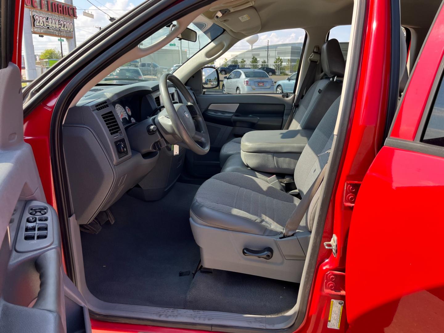 2008 red /gray Dodge Ram 1500 Laramie Quad Cab 2WD (1D7HA18N48S) with an 4.7L V8 SOHC 16V engine, located at 14700 Tomball Parkway 249, Houston, TX, 77086, (281) 444-2200, 29.928619, -95.504074 - Photo#8