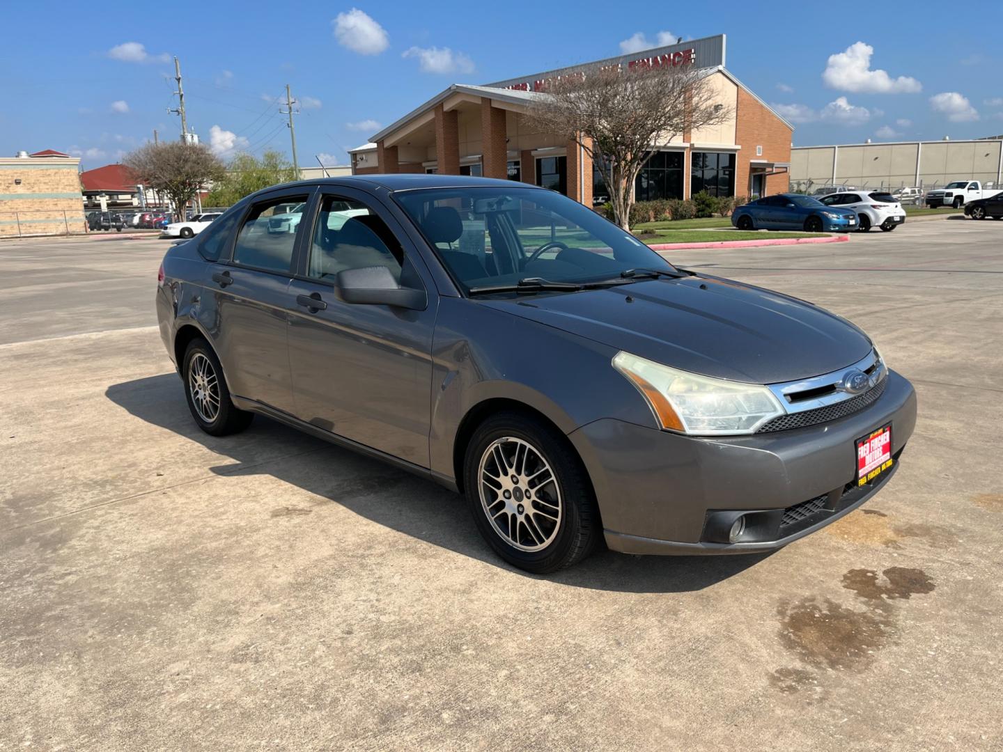 2010 /black Ford Focus SE Sedan (1FAHP3FN5AW) with an 2.0L L4 DOHC 16V engine, Automatic transmission, located at 14700 Tomball Parkway 249, Houston, TX, 77086, (281) 444-2200, 29.928619, -95.504074 - Photo#0