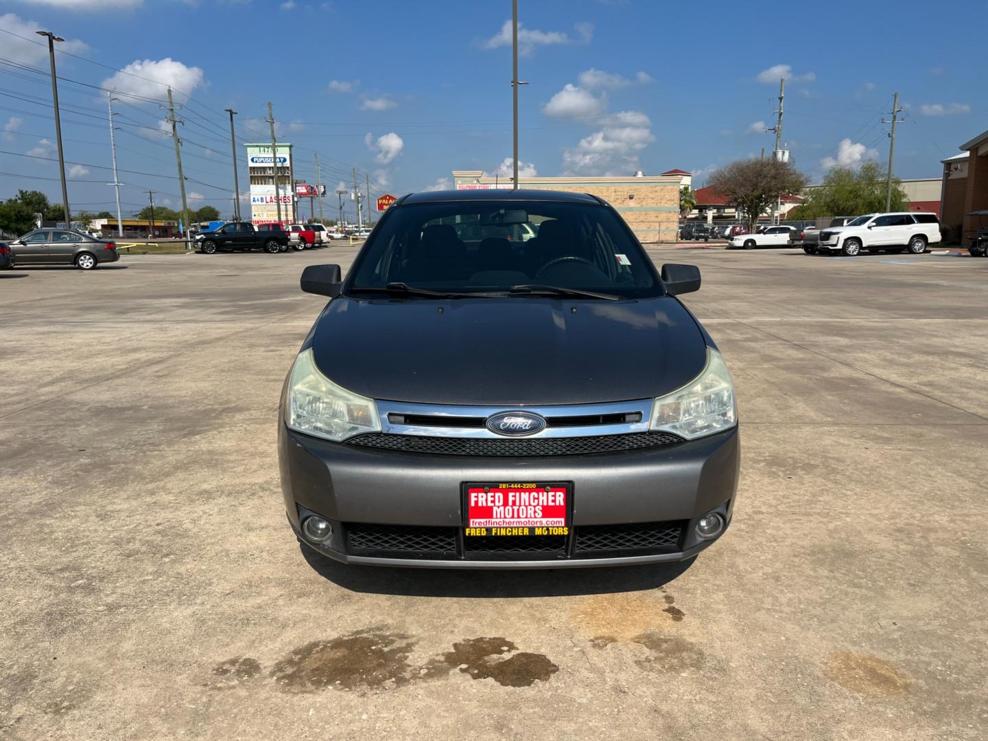 2010 /black Ford Focus SE Sedan (1FAHP3FN5AW) with an 2.0L L4 DOHC 16V engine, Automatic transmission, located at 14700 Tomball Parkway 249, Houston, TX, 77086, (281) 444-2200, 29.928619, -95.504074 - Photo#1