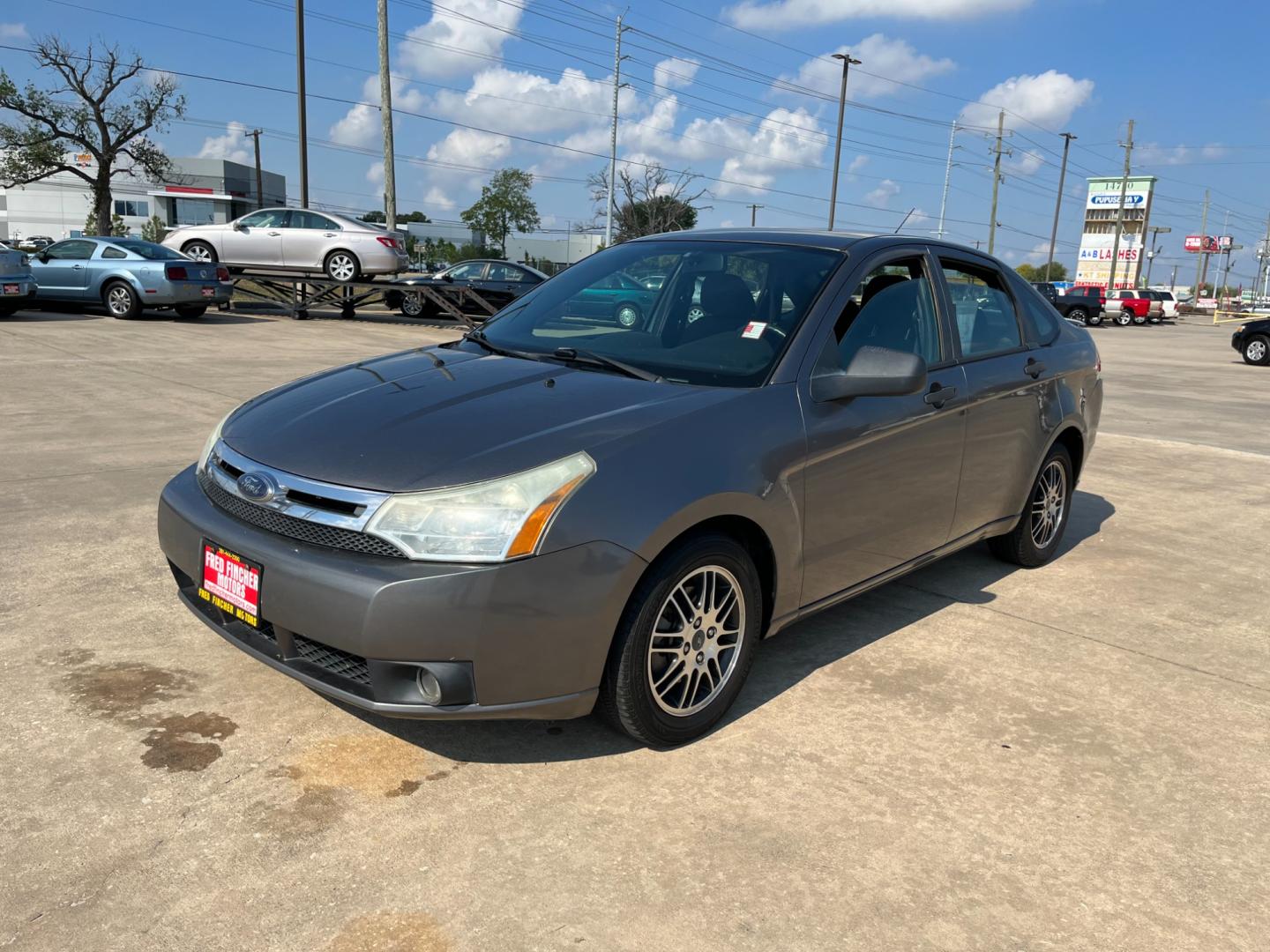 2010 /black Ford Focus SE Sedan (1FAHP3FN5AW) with an 2.0L L4 DOHC 16V engine, Automatic transmission, located at 14700 Tomball Parkway 249, Houston, TX, 77086, (281) 444-2200, 29.928619, -95.504074 - Photo#2