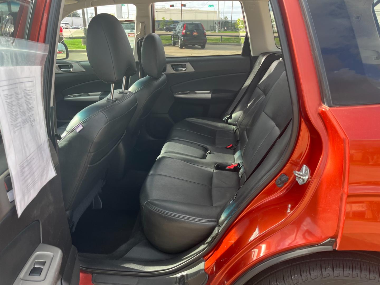 2010 orange /black Subaru Forester 2.5X Premium (JF2SH6CCXAH) with an 2.5L H4 SOHC 16V engine, 4-Speed Automatic transmission, located at 14700 Tomball Parkway 249, Houston, TX, 77086, (281) 444-2200, 29.928619, -95.504074 - Photo#9