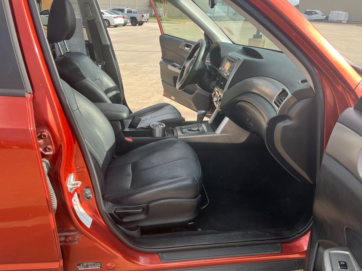 2010 orange /black Subaru Forester 2.5X Premium (JF2SH6CCXAH) with an 2.5L H4 SOHC 16V engine, 4-Speed Automatic transmission, located at 14700 Tomball Parkway 249, Houston, TX, 77086, (281) 444-2200, 29.928619, -95.504074 - Photo#11