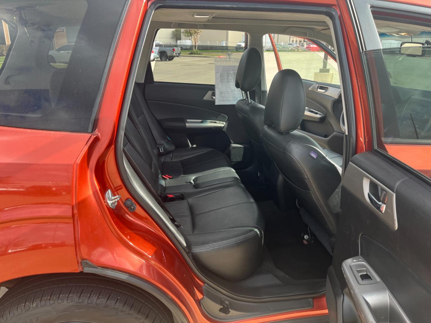 2010 orange /black Subaru Forester 2.5X Premium (JF2SH6CCXAH) with an 2.5L H4 SOHC 16V engine, 4-Speed Automatic transmission, located at 14700 Tomball Parkway 249, Houston, TX, 77086, (281) 444-2200, 29.928619, -95.504074 - Photo#12