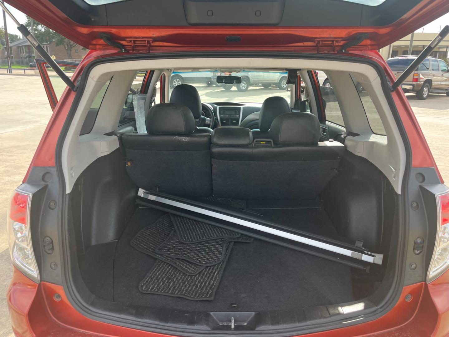 2010 orange /black Subaru Forester 2.5X Premium (JF2SH6CCXAH) with an 2.5L H4 SOHC 16V engine, 4-Speed Automatic transmission, located at 14700 Tomball Parkway 249, Houston, TX, 77086, (281) 444-2200, 29.928619, -95.504074 - Photo#13