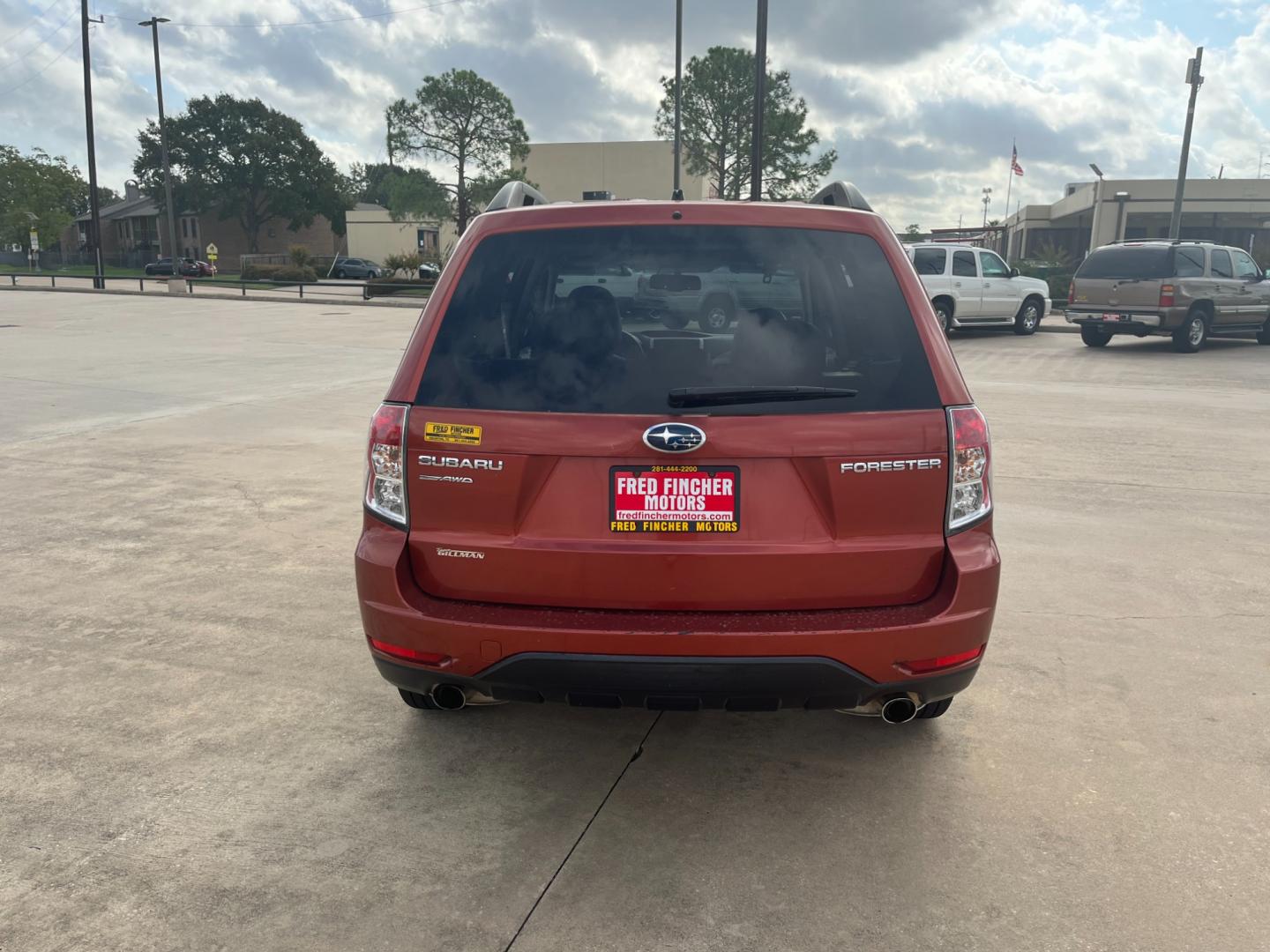 2010 orange /black Subaru Forester 2.5X Premium (JF2SH6CCXAH) with an 2.5L H4 SOHC 16V engine, 4-Speed Automatic transmission, located at 14700 Tomball Parkway 249, Houston, TX, 77086, (281) 444-2200, 29.928619, -95.504074 - Photo#5