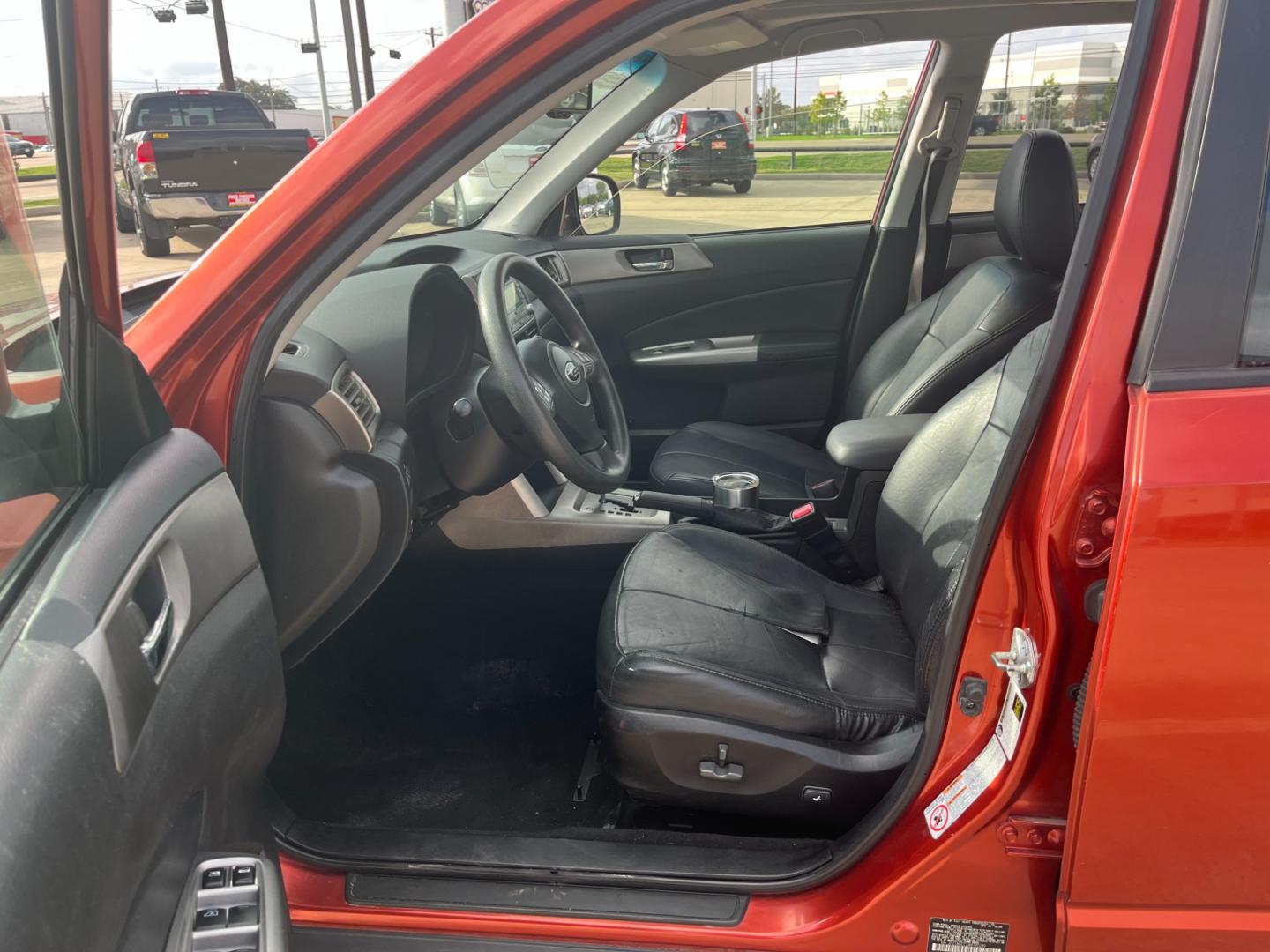 2010 orange /black Subaru Forester 2.5X Premium (JF2SH6CCXAH) with an 2.5L H4 SOHC 16V engine, 4-Speed Automatic transmission, located at 14700 Tomball Parkway 249, Houston, TX, 77086, (281) 444-2200, 29.928619, -95.504074 - Photo#8