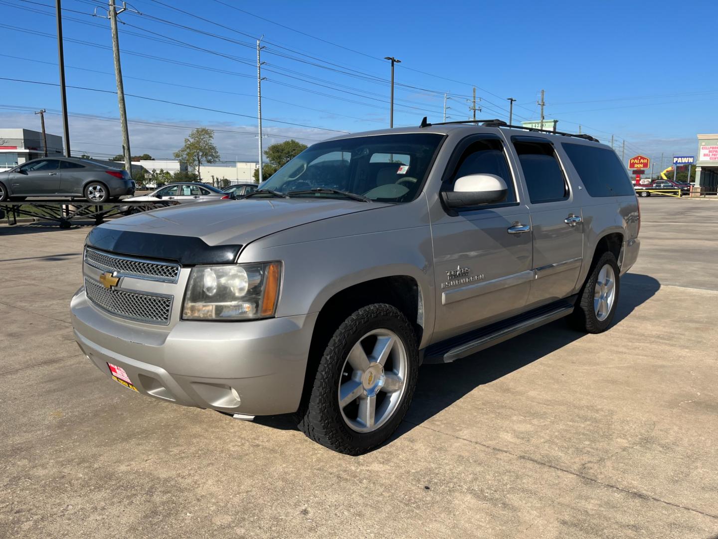 2007 SILVER /gray Chevrolet Suburban LS 1500 2WD (3GNFC16007G) with an 5.3L V8 OHV 16V FFV engine, 4-Speed Automatic Overdrive transmission, located at 14700 Tomball Parkway 249, Houston, TX, 77086, (281) 444-2200, 29.928619, -95.504074 - Photo#2