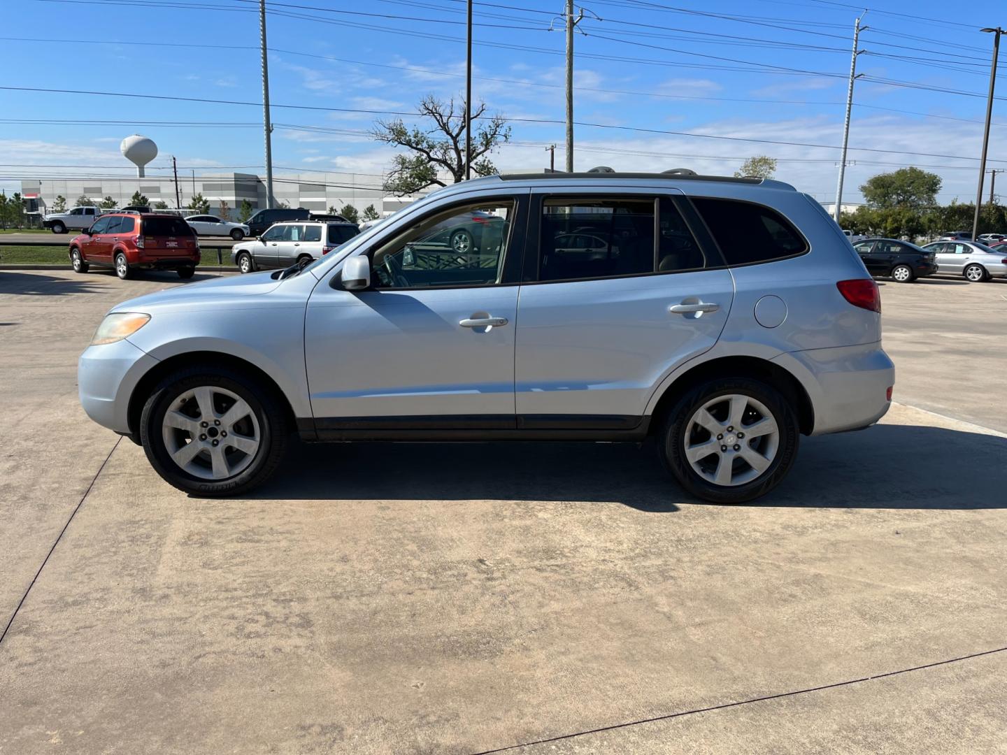 2007 blue /TAN Hyundai Santa Fe Limited (5NMSH13E87H) with an 3.3L V6 DOHC 24V engine, 5-Speed Automatic Overdrive transmission, located at 14700 Tomball Parkway 249, Houston, TX, 77086, (281) 444-2200, 29.928619, -95.504074 - Photo#3