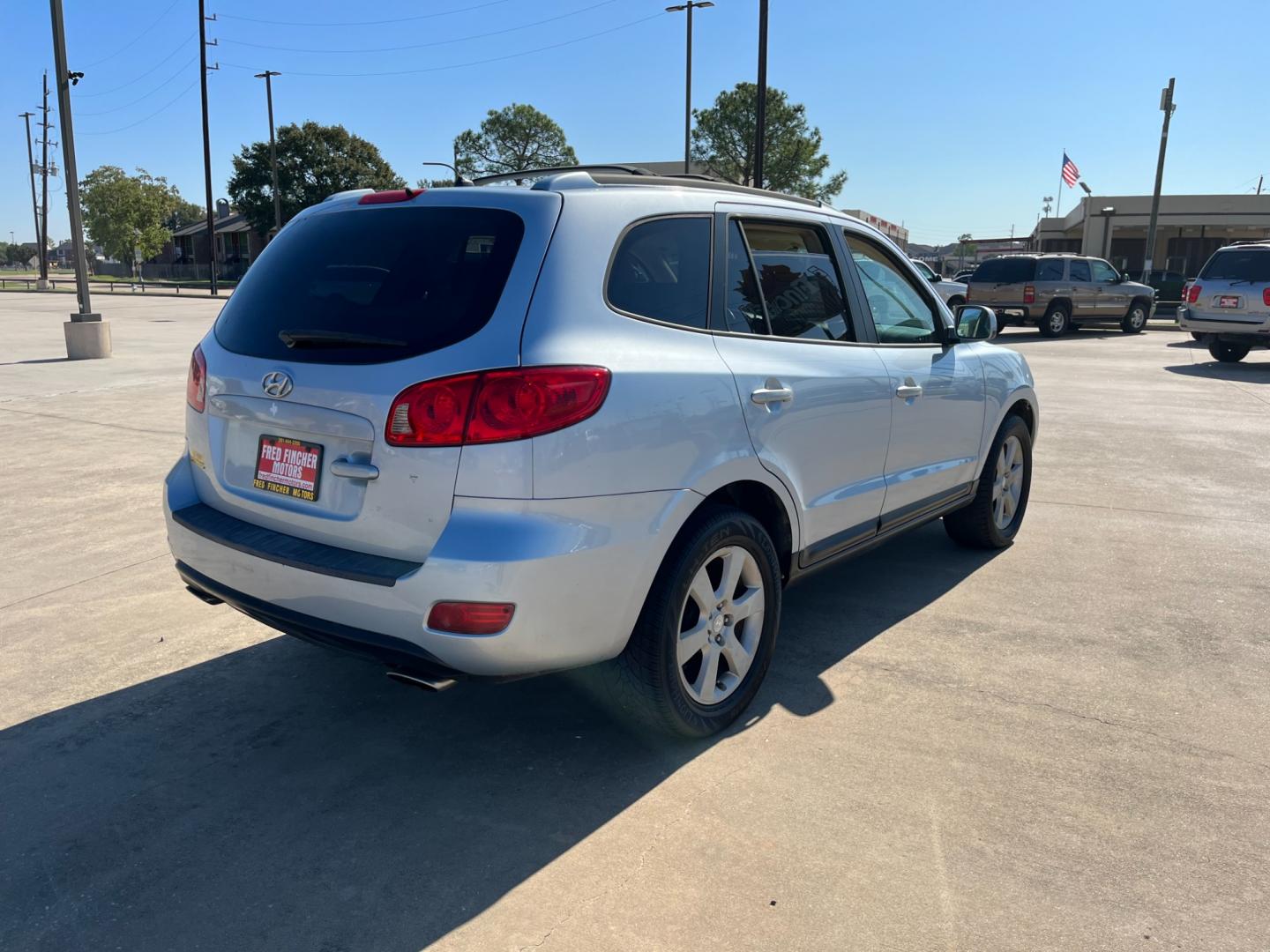 2007 blue /TAN Hyundai Santa Fe Limited (5NMSH13E87H) with an 3.3L V6 DOHC 24V engine, 5-Speed Automatic Overdrive transmission, located at 14700 Tomball Parkway 249, Houston, TX, 77086, (281) 444-2200, 29.928619, -95.504074 - Photo#6