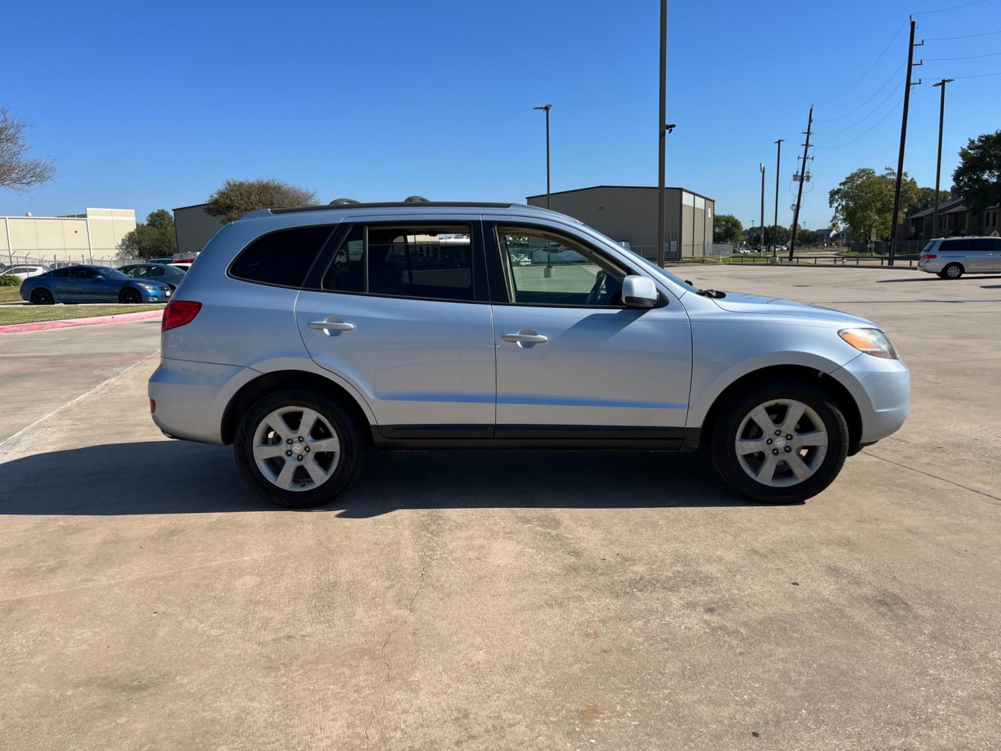 2007 blue /TAN Hyundai Santa Fe Limited (5NMSH13E87H) with an 3.3L V6 DOHC 24V engine, 5-Speed Automatic Overdrive transmission, located at 14700 Tomball Parkway 249, Houston, TX, 77086, (281) 444-2200, 29.928619, -95.504074 - Photo#7