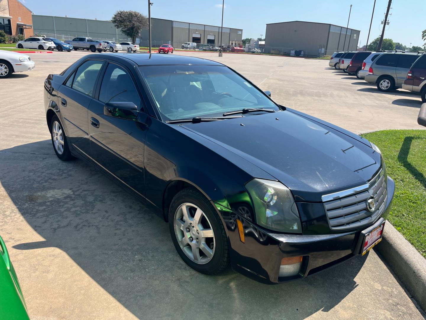 2005 Black /TAN Cadillac CTS 3.6L (1G6DP567050) with an 3.6L V6 DOHC 24V engine, Automatic transmission, located at 14700 Tomball Parkway 249, Houston, TX, 77086, (281) 444-2200, 29.928619, -95.504074 - Photo#0