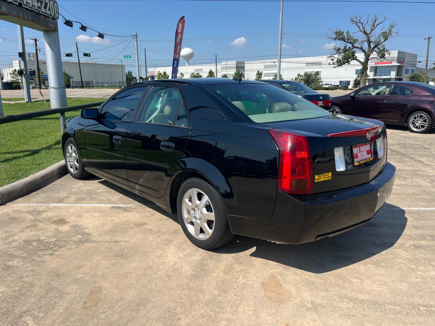 2005 Black /TAN Cadillac CTS 3.6L (1G6DP567050) with an 3.6L V6 DOHC 24V engine, Automatic transmission, located at 14700 Tomball Parkway 249, Houston, TX, 77086, (281) 444-2200, 29.928619, -95.504074 - Photo#4