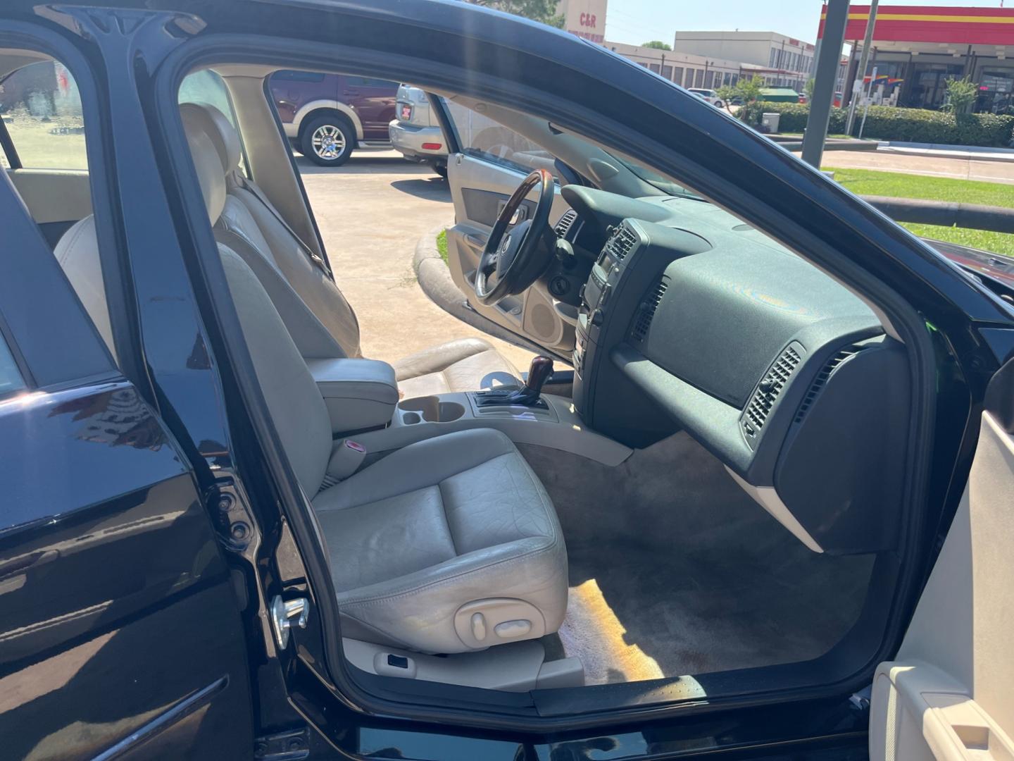 2005 Black /TAN Cadillac CTS 3.6L (1G6DP567050) with an 3.6L V6 DOHC 24V engine, Automatic transmission, located at 14700 Tomball Parkway 249, Houston, TX, 77086, (281) 444-2200, 29.928619, -95.504074 - Photo#11