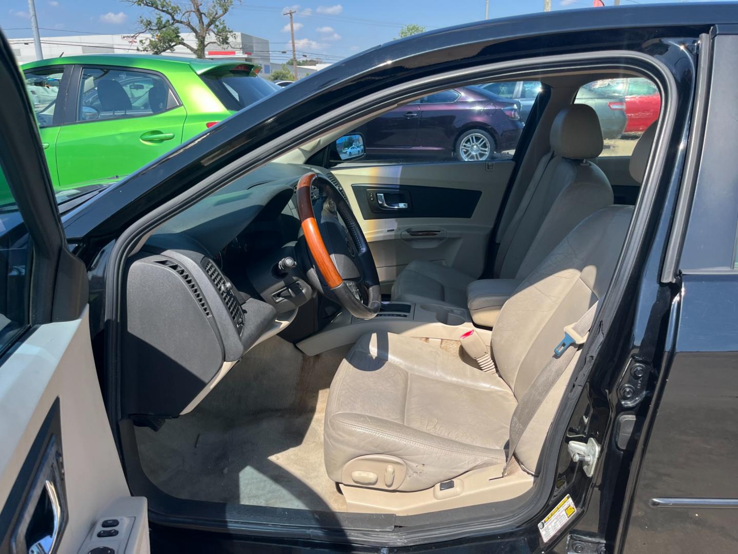 2005 Black /TAN Cadillac CTS 3.6L (1G6DP567050) with an 3.6L V6 DOHC 24V engine, Automatic transmission, located at 14700 Tomball Parkway 249, Houston, TX, 77086, (281) 444-2200, 29.928619, -95.504074 - Photo#8