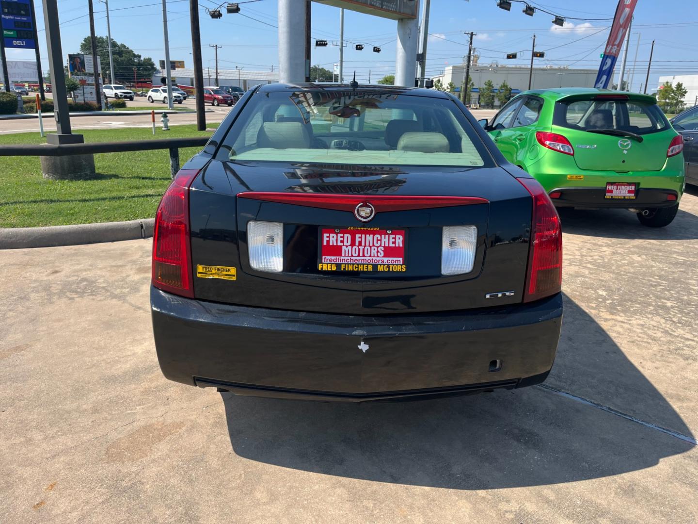 2005 Black /TAN Cadillac CTS 3.6L (1G6DP567050) with an 3.6L V6 DOHC 24V engine, Automatic transmission, located at 14700 Tomball Parkway 249, Houston, TX, 77086, (281) 444-2200, 29.928619, -95.504074 - Photo#5