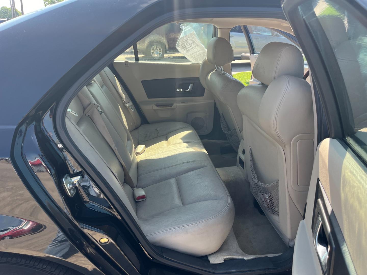 2005 Black /TAN Cadillac CTS 3.6L (1G6DP567050) with an 3.6L V6 DOHC 24V engine, Automatic transmission, located at 14700 Tomball Parkway 249, Houston, TX, 77086, (281) 444-2200, 29.928619, -95.504074 - Photo#12