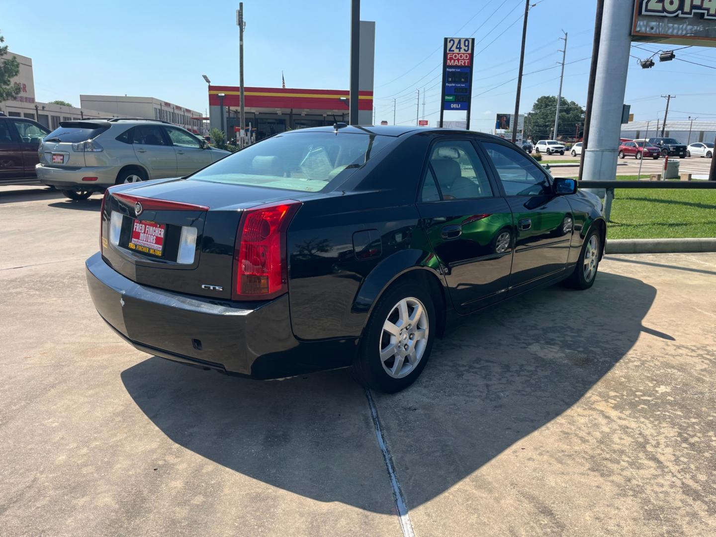 2005 Black /TAN Cadillac CTS 3.6L (1G6DP567050) with an 3.6L V6 DOHC 24V engine, Automatic transmission, located at 14700 Tomball Parkway 249, Houston, TX, 77086, (281) 444-2200, 29.928619, -95.504074 - Photo#6