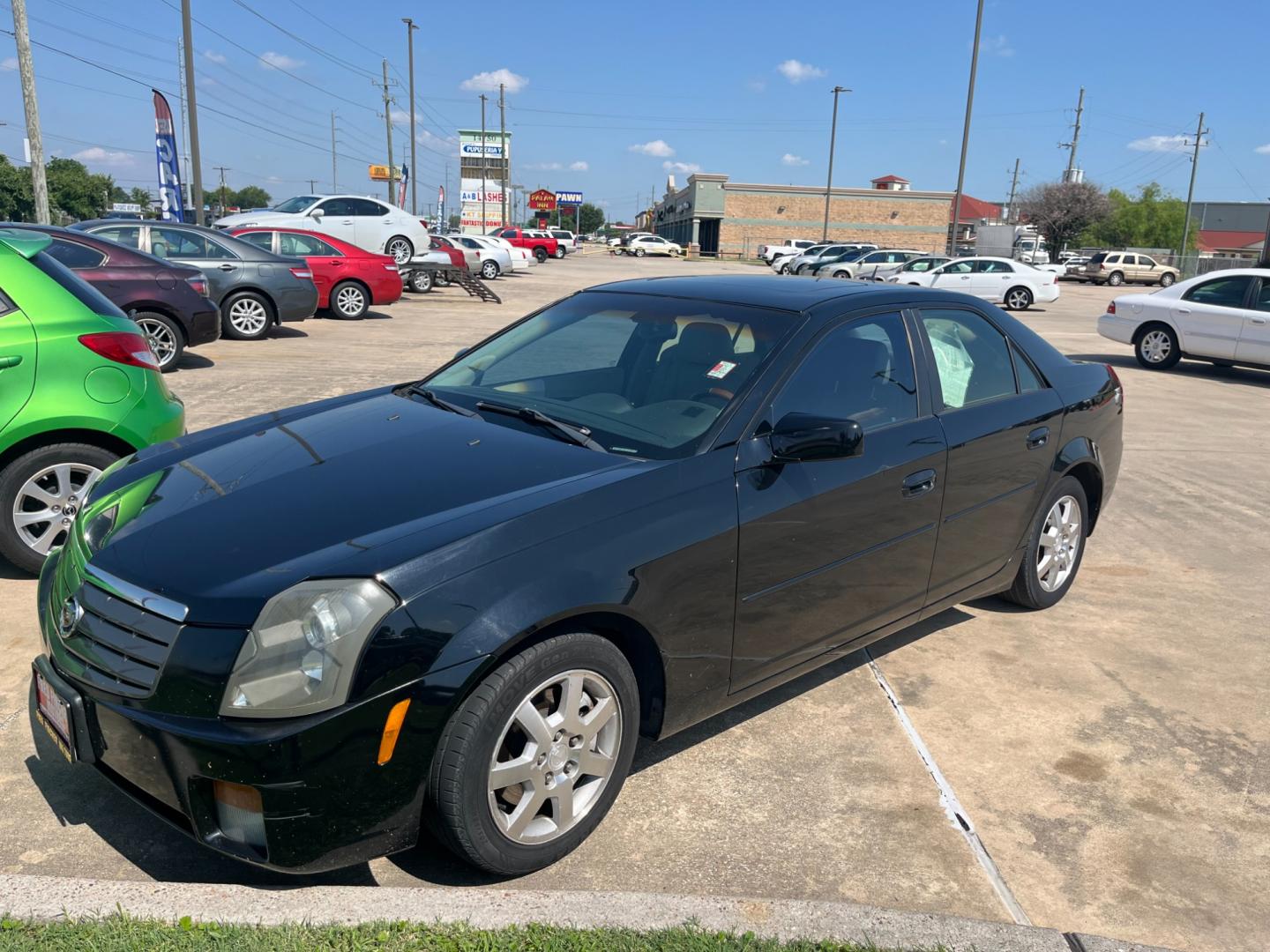 2005 Black /TAN Cadillac CTS 3.6L (1G6DP567050) with an 3.6L V6 DOHC 24V engine, Automatic transmission, located at 14700 Tomball Parkway 249, Houston, TX, 77086, (281) 444-2200, 29.928619, -95.504074 - Photo#2