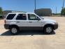 2001 white /black Ford Escape XLT 4WD (1FMCU04191K) with an 3.0L V6 DOHC 24V engine, Automatic transmission, located at 14700 Tomball Parkway 249, Houston, TX, 77086, (281) 444-2200, 29.928619, -95.504074 - Photo#7